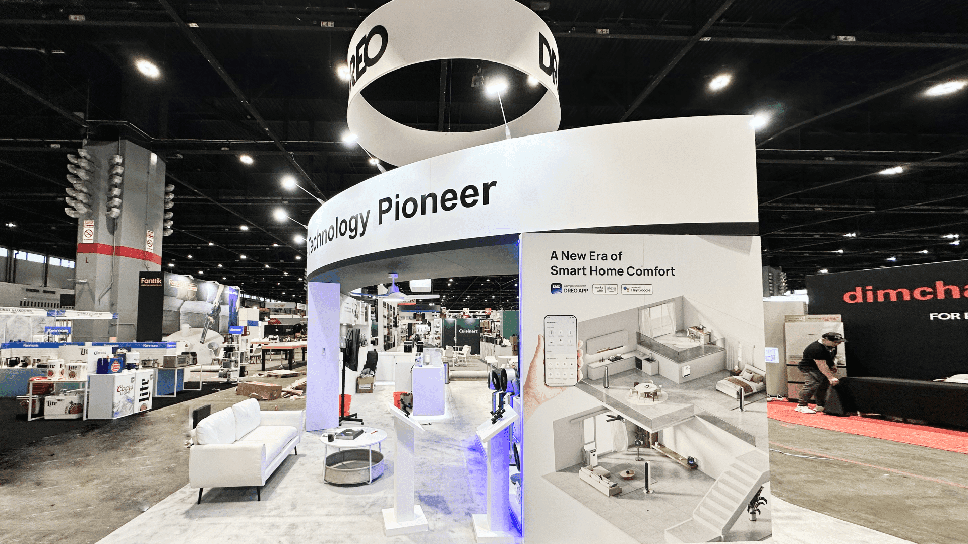 connected technology booth with multi-screen demo stations and structured installation for IoT systems