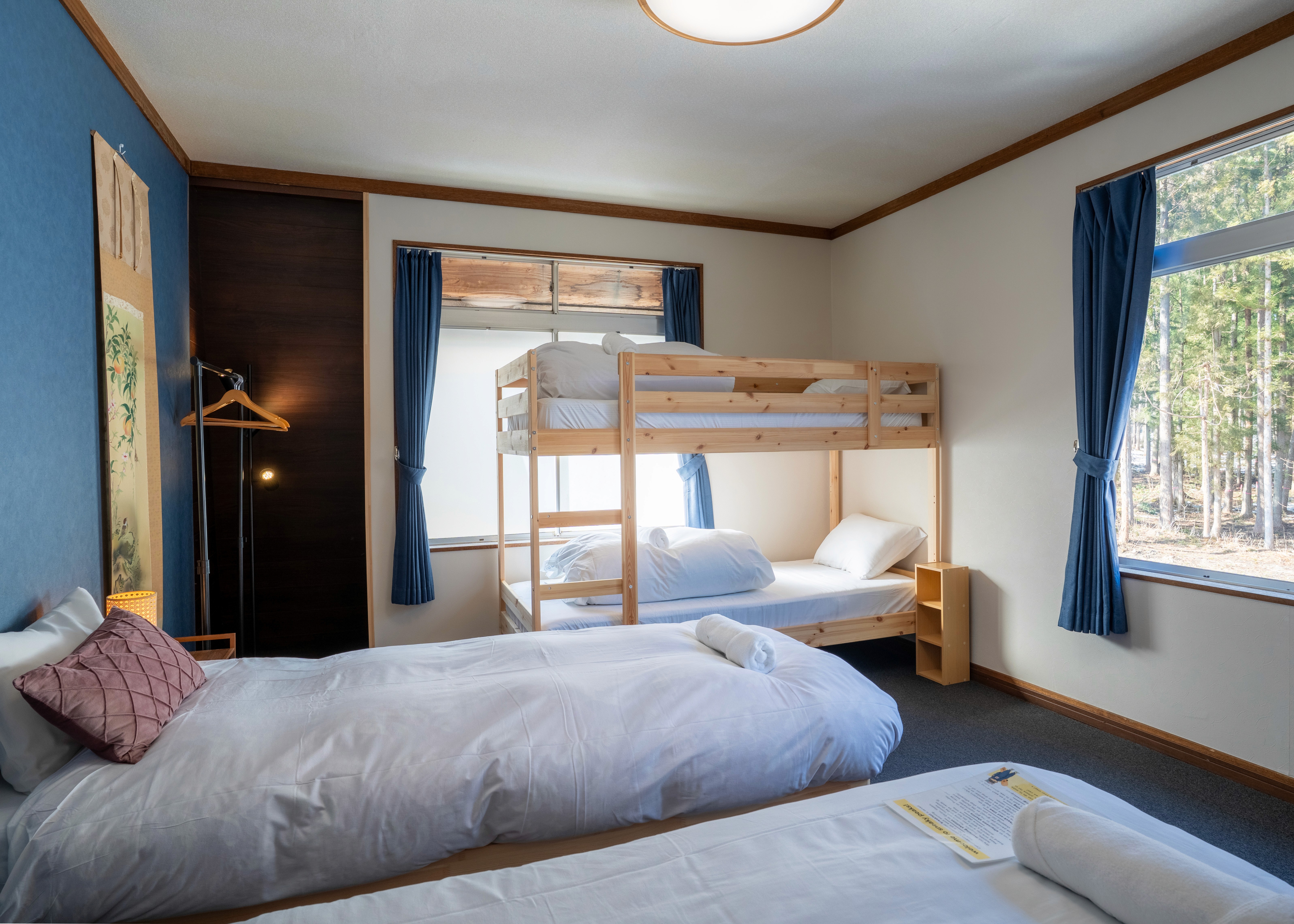 Quad room interior at Sneaky Peaks, Hakuba