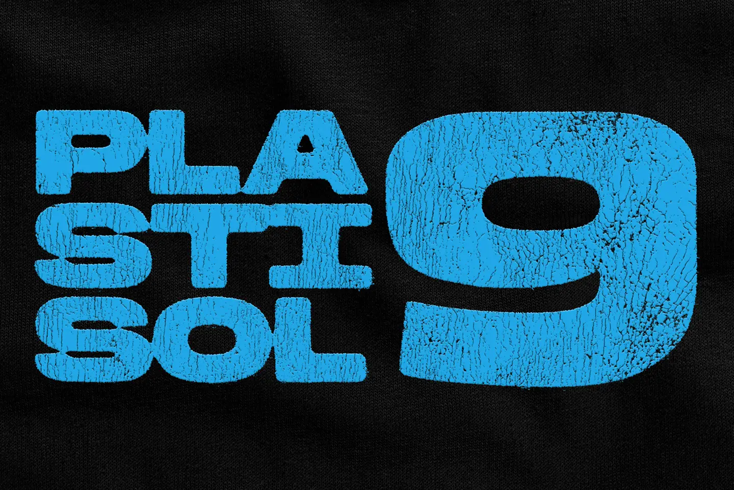 Blue screen printed typography with cracked plastisol ink texture on dark fabric background