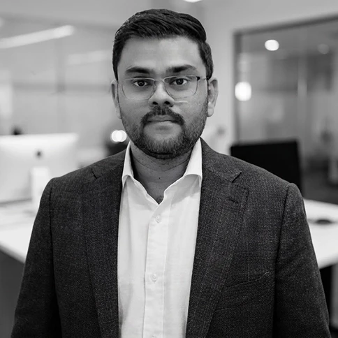 Black-and-white portrait of Trustethica founder Vivegavalen Vadi Valu.