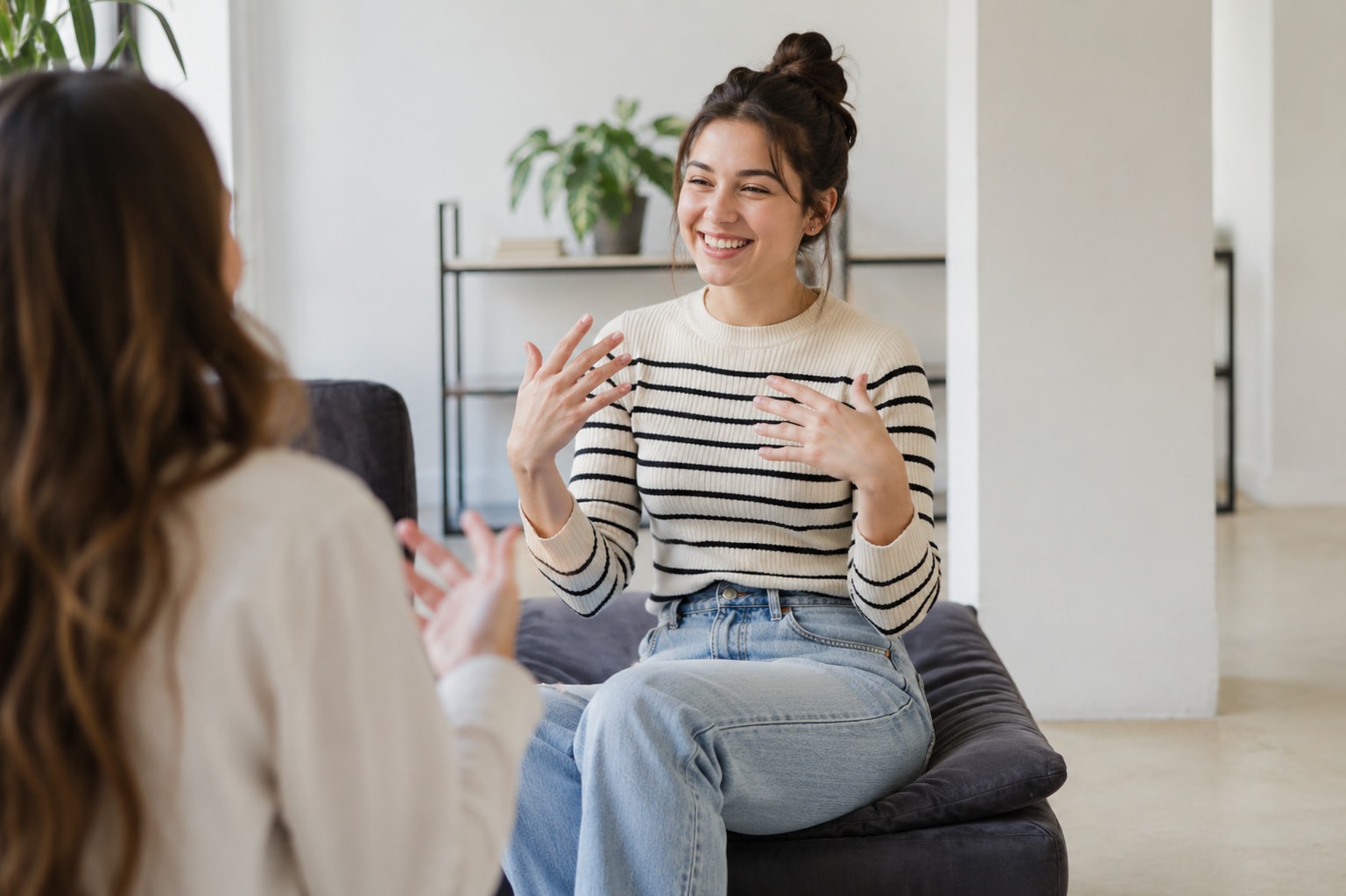 Woman demonstrating strong interpersonal skills through engaged and expressive conversation