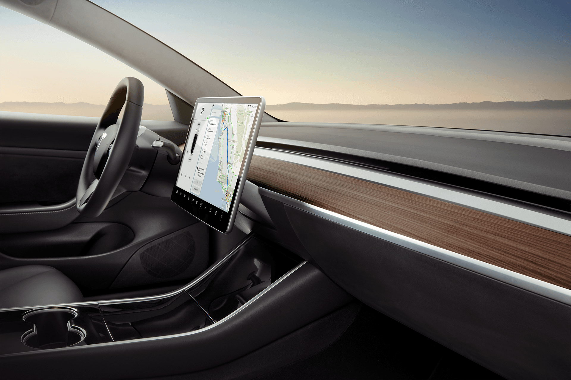 Habitacle de la Tesla Model 3 avec grand écran central, design minimaliste et finition bois sur la planche de bord