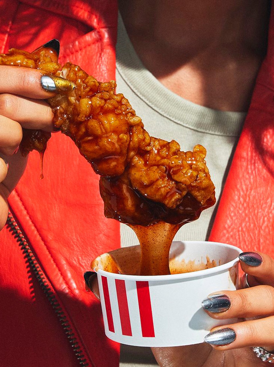 A beautifully arranged table with various dishes, fruits, and wine, evoking a warm dining atmosphere.