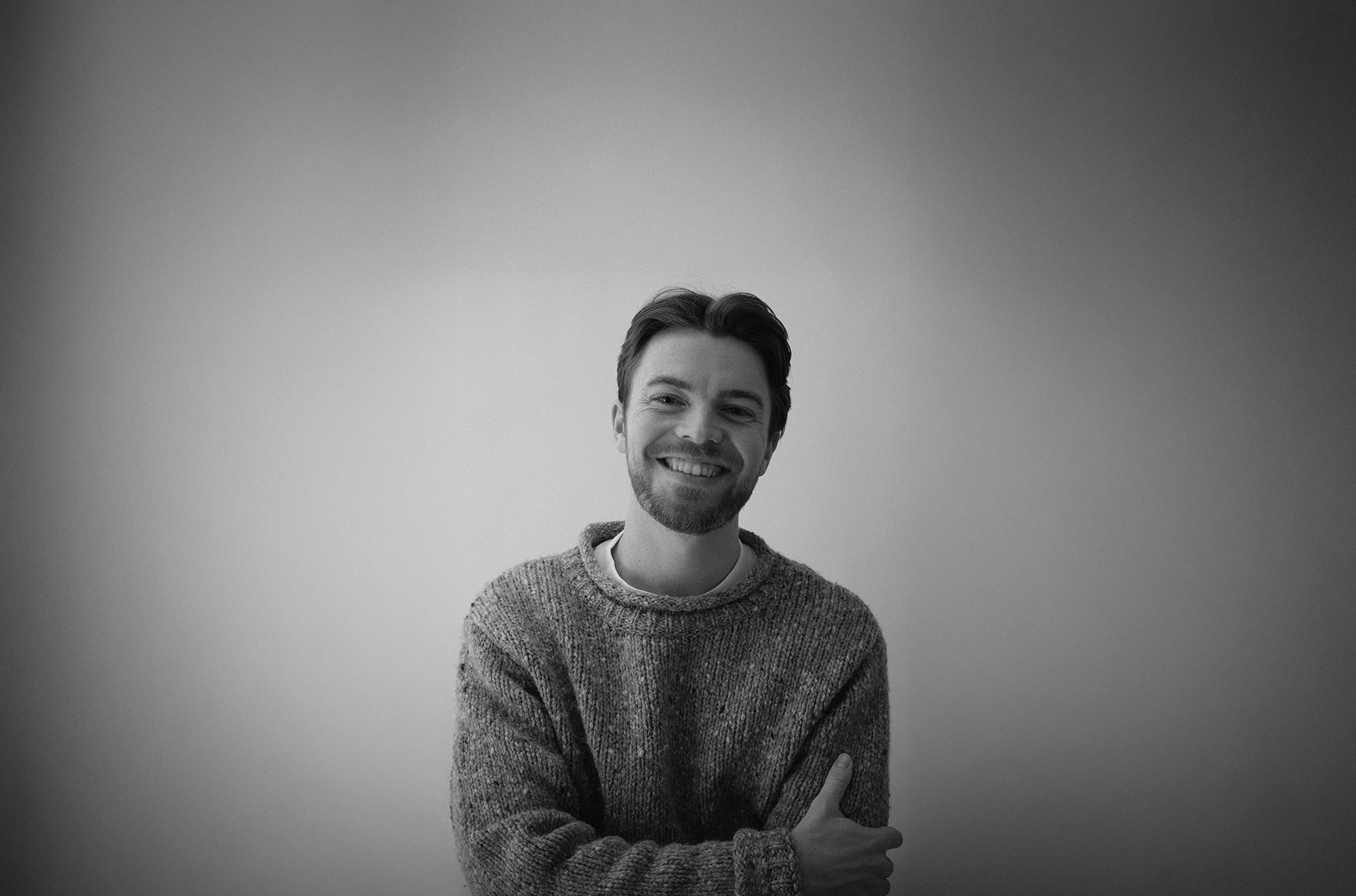 A black and white headshot photo of Sean Peabody.
