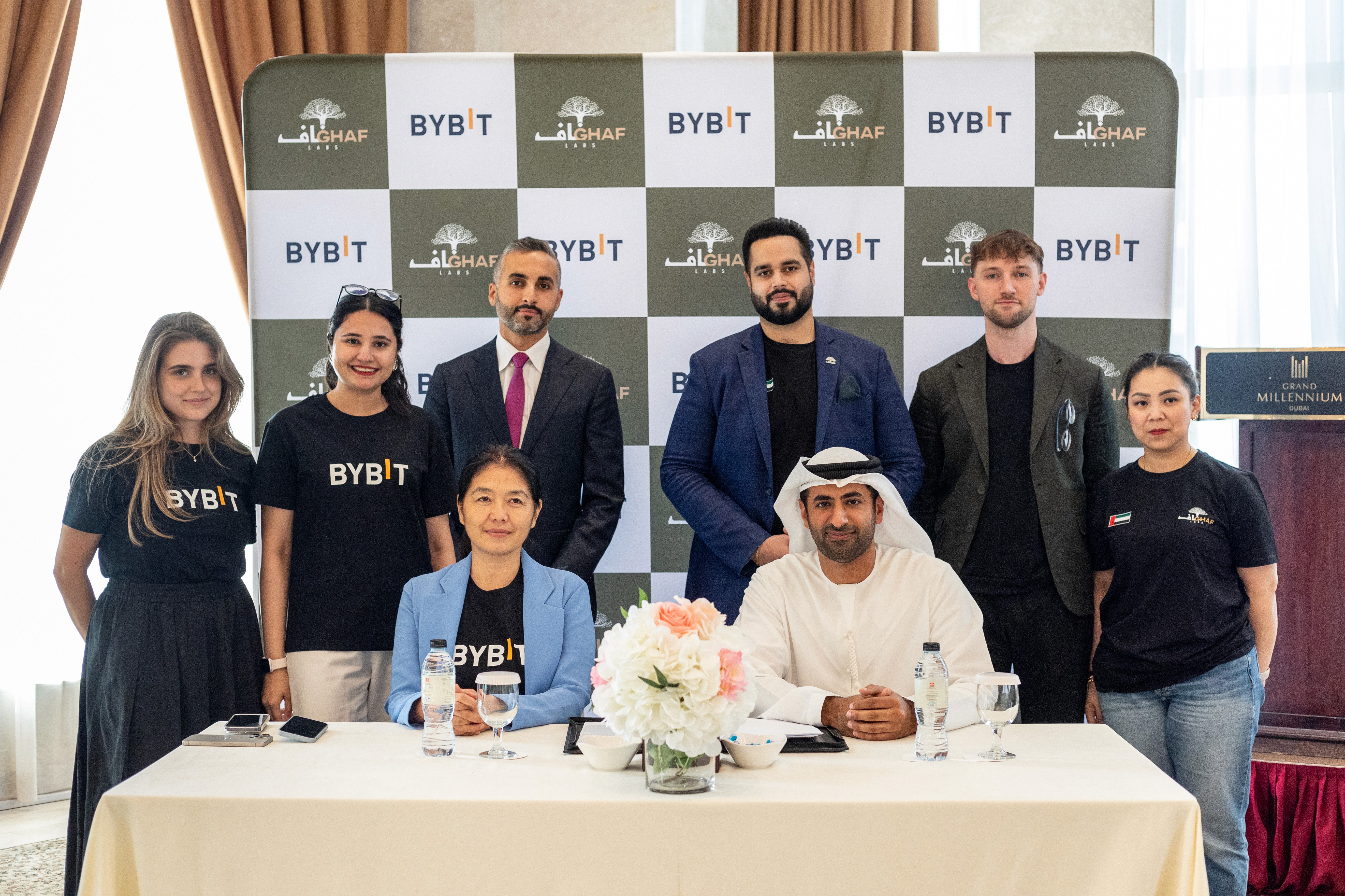 a green statue of a person