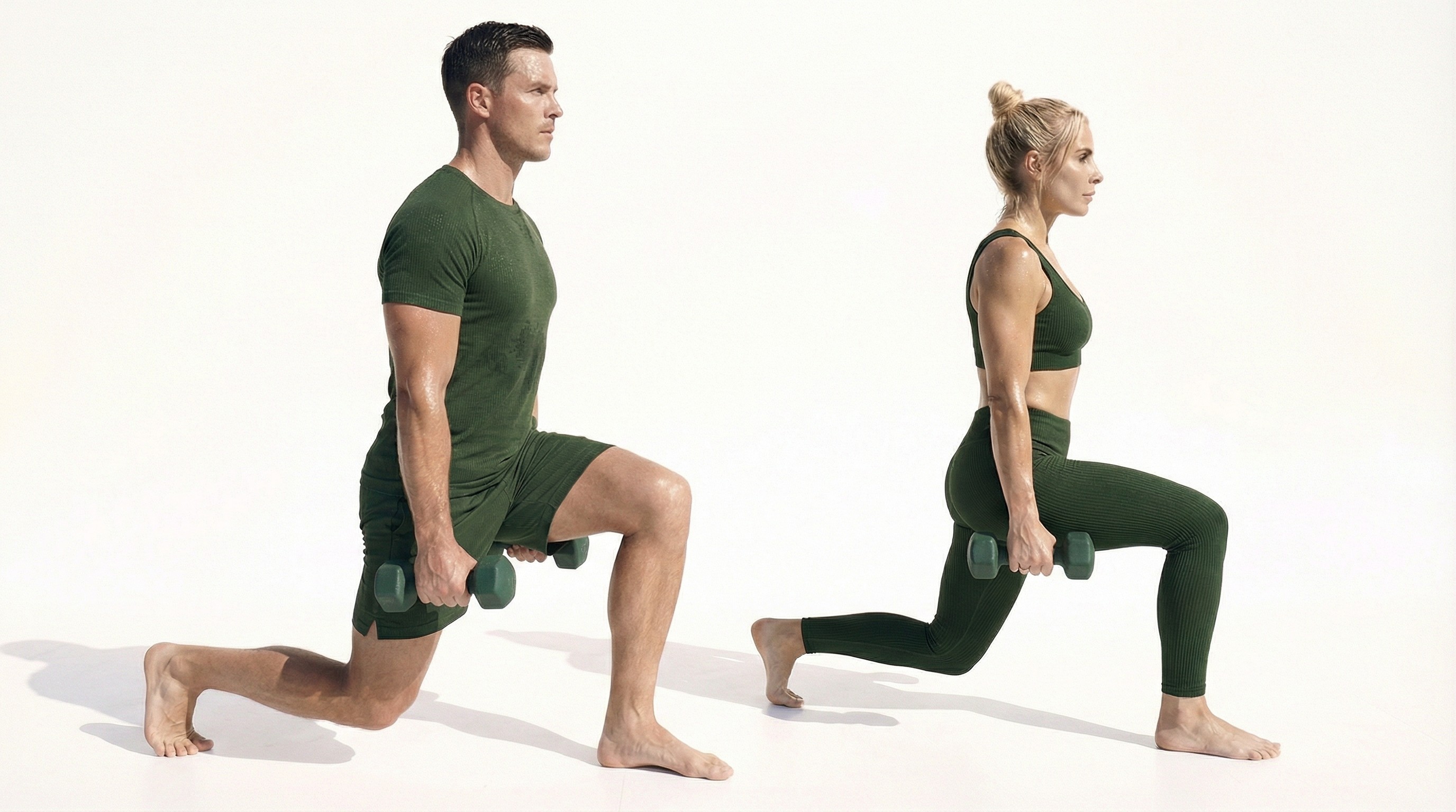 Man and woman performing weighted lunges during a HIIT class at MokoBoko Studio, Lisbon