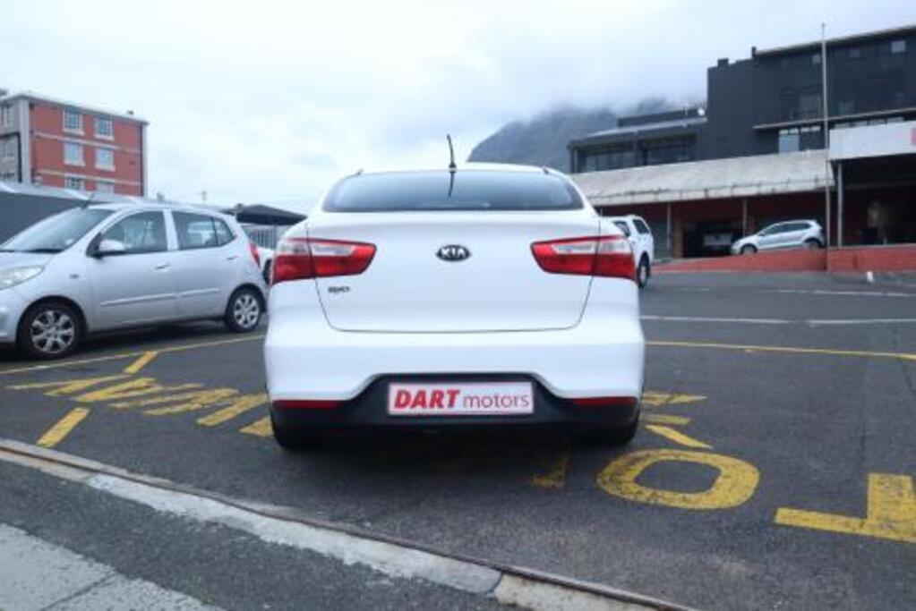 man in white crew neck shirt wearing black framed eyeglasses