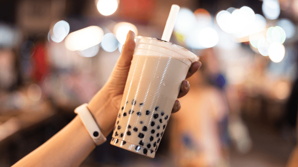 A woman holding bubble tea