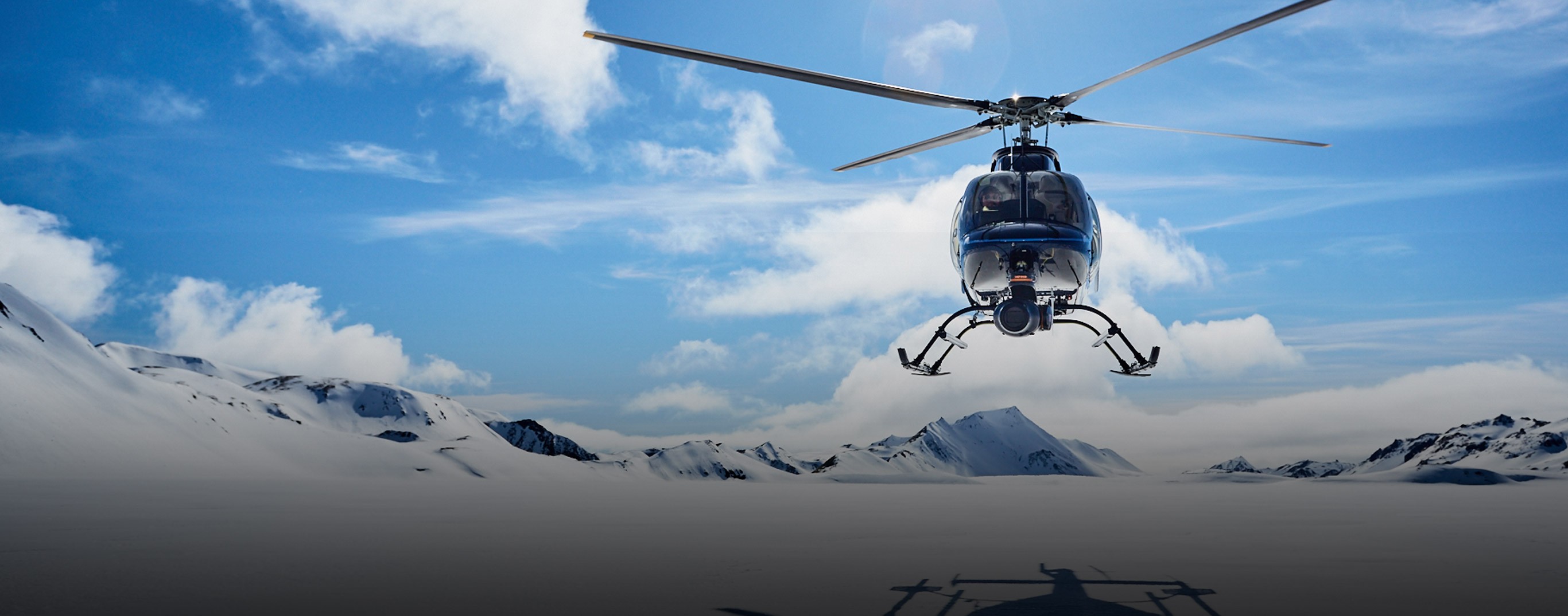 A man running along a forest path.