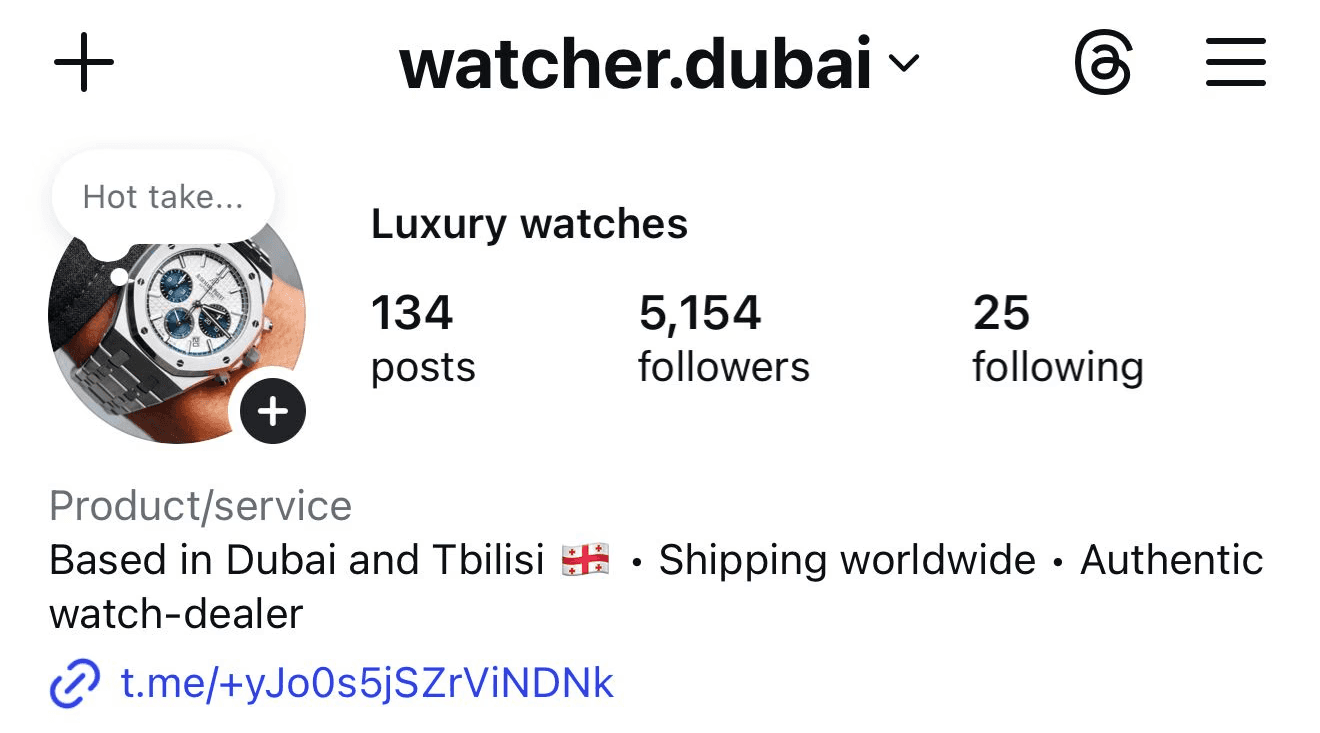 black DSLR camera floating over man's hand at the woods