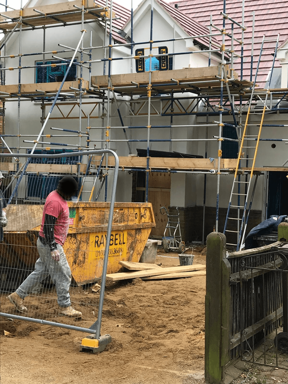 PPM Builders applying premium silicon render to a residential property in Northampton. Scaffolding in place for a professional exterior finish, enhancing durability, weather resistance, and aesthetics for a modern home renovation.