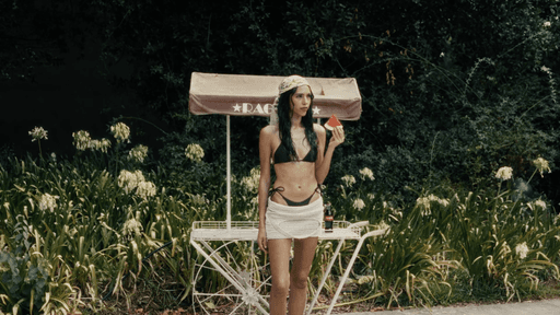 a woman holding an apple