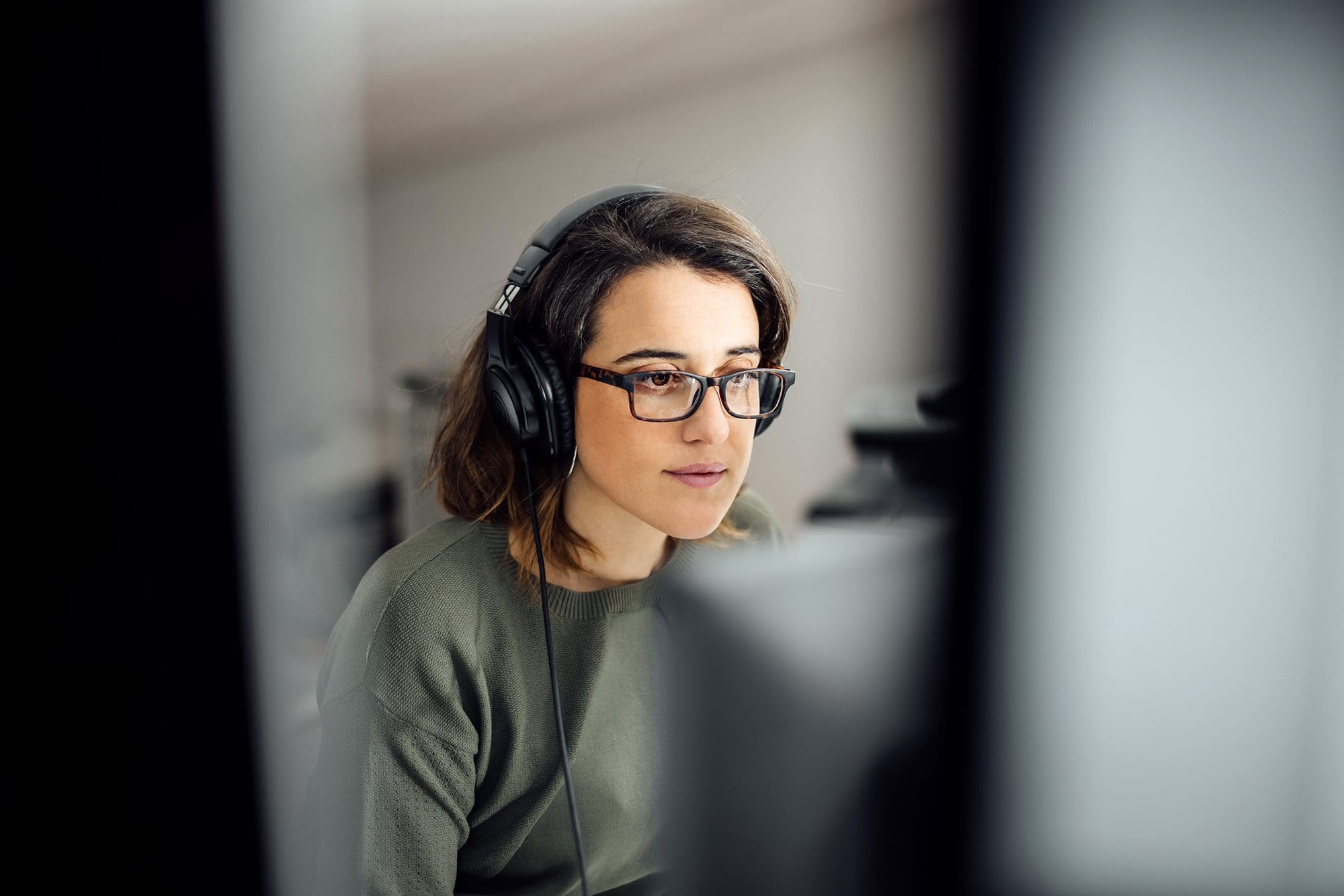 Woman working on the computer at work or home.