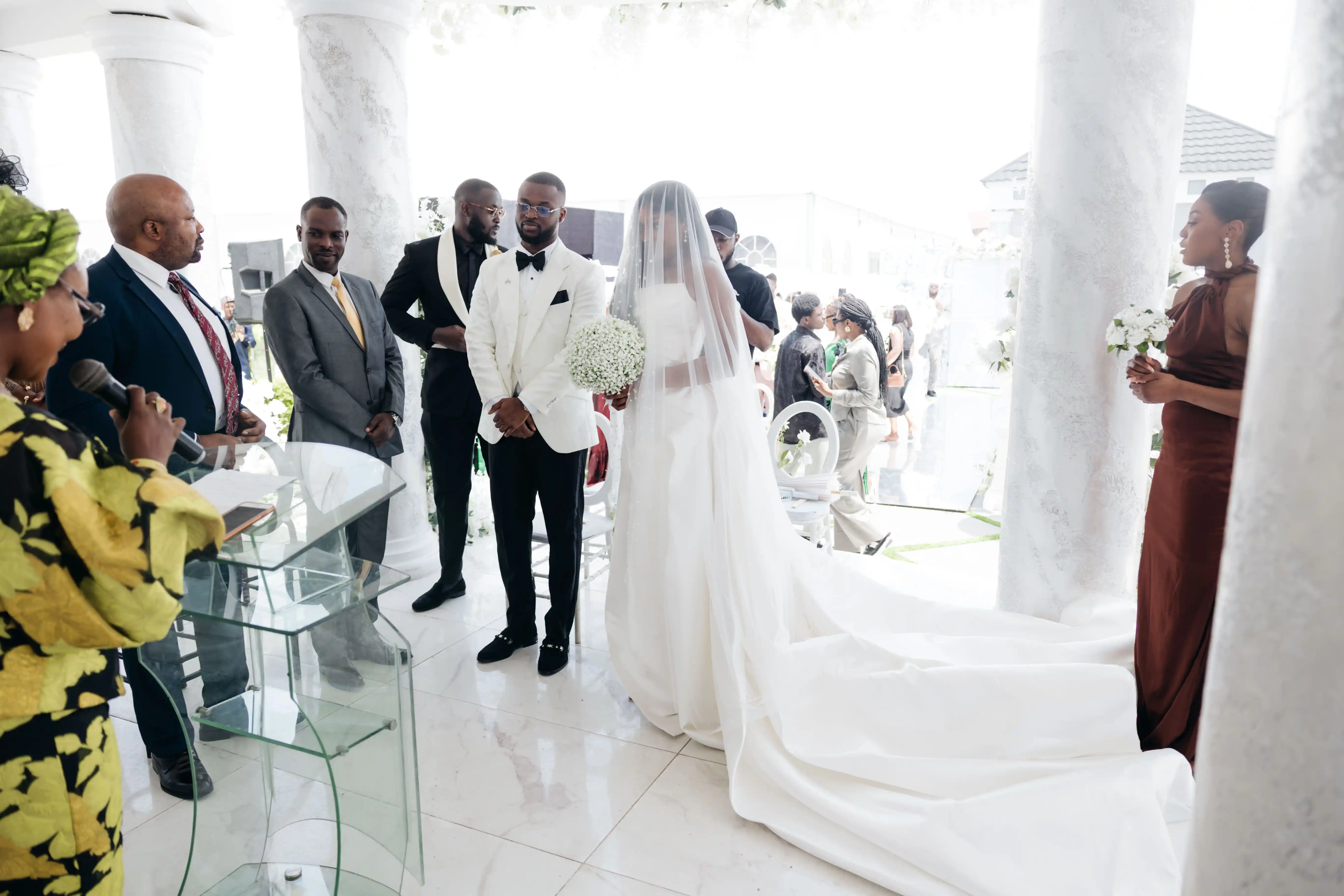 Bride and groom celebrating a luxury wedding coordinated by Victoria Brooks Events, a premium wedding planner in Nigeria.