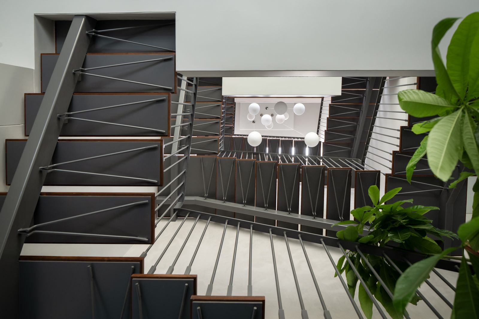 a living room filled with furniture and a flat screen tv