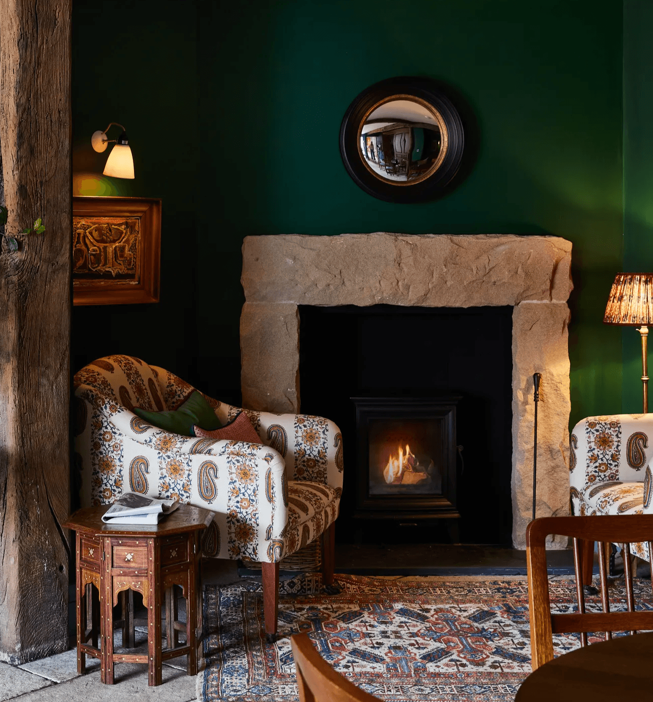The Bear Inn heritage lounge refurbishment with stone fireplace, timber beam and traditional pub interiors