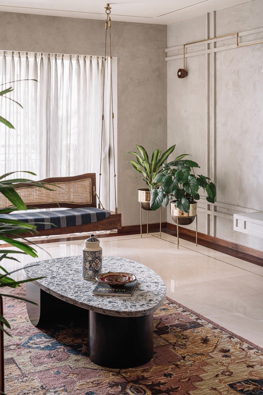 A bathroom with a towel and washing sink