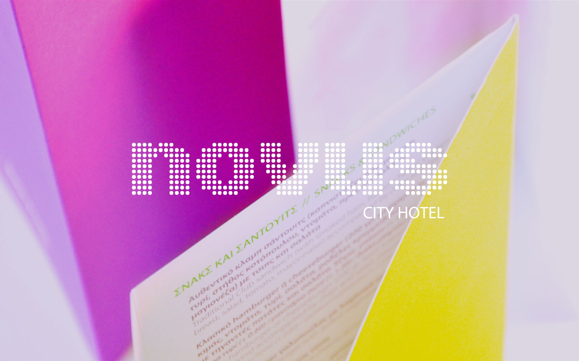 Application of the Novus City Hotel identity on a restaurant catalogue with a bold color palette