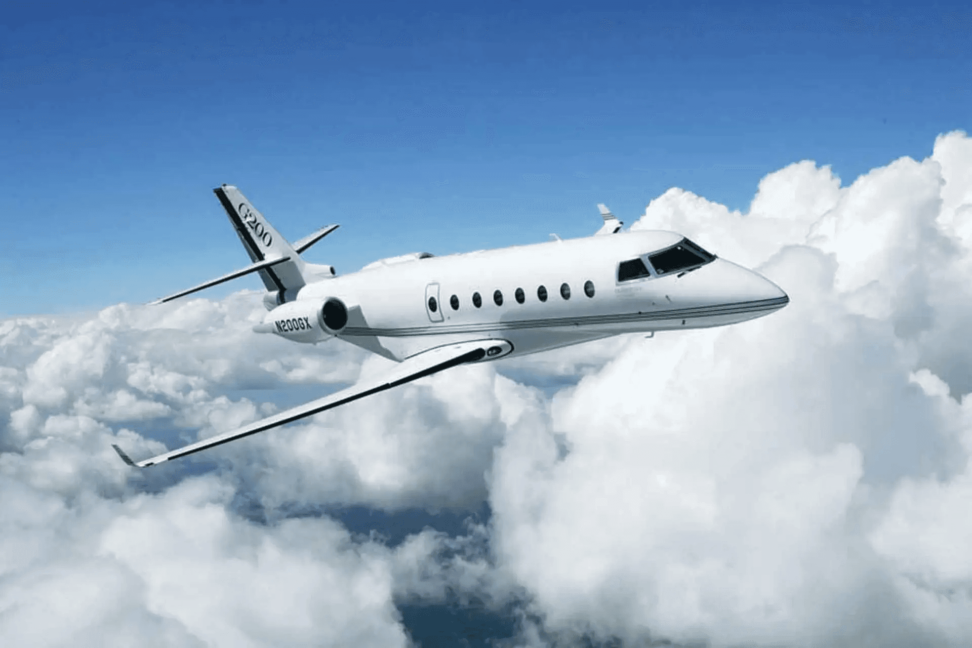 white airliner on gray pavement