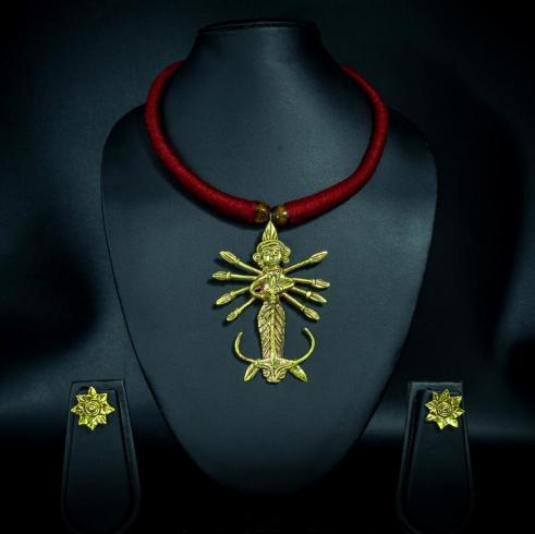 Handcrafted dokra maa durga tribal necklace set with red cotton tassels