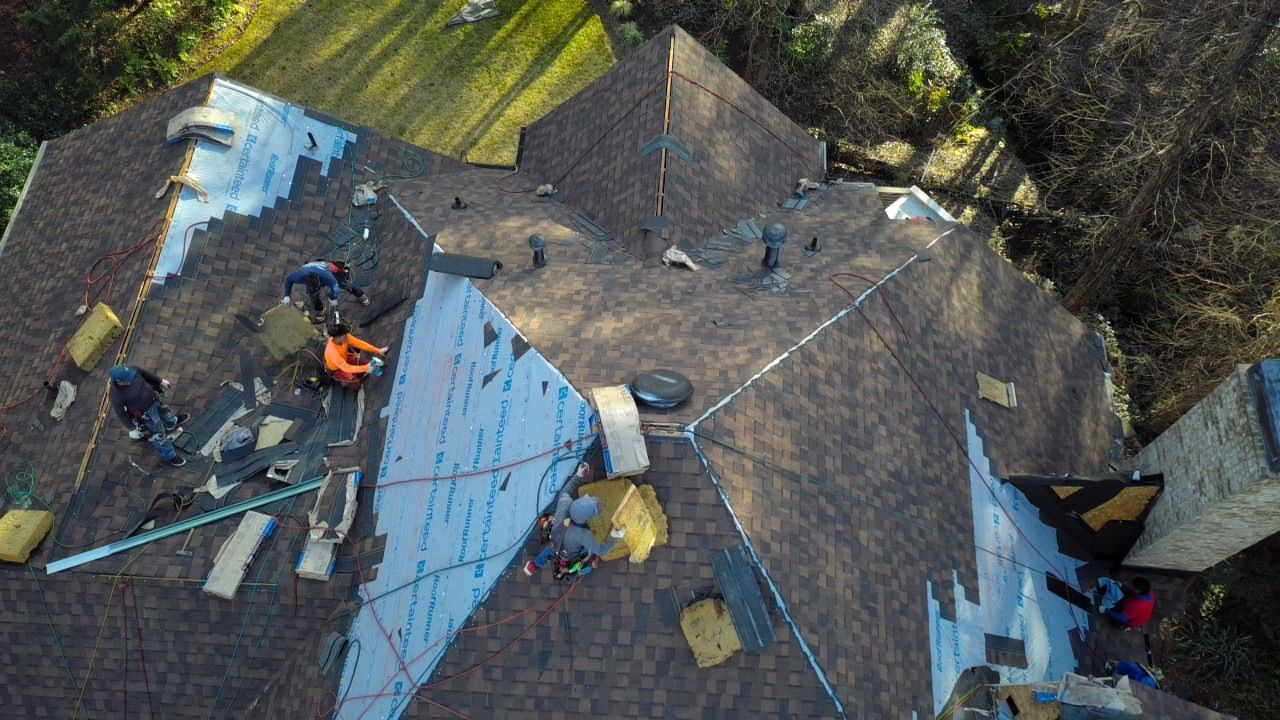SkyPro crew installing the new roof on a home in Alpharetta, GA