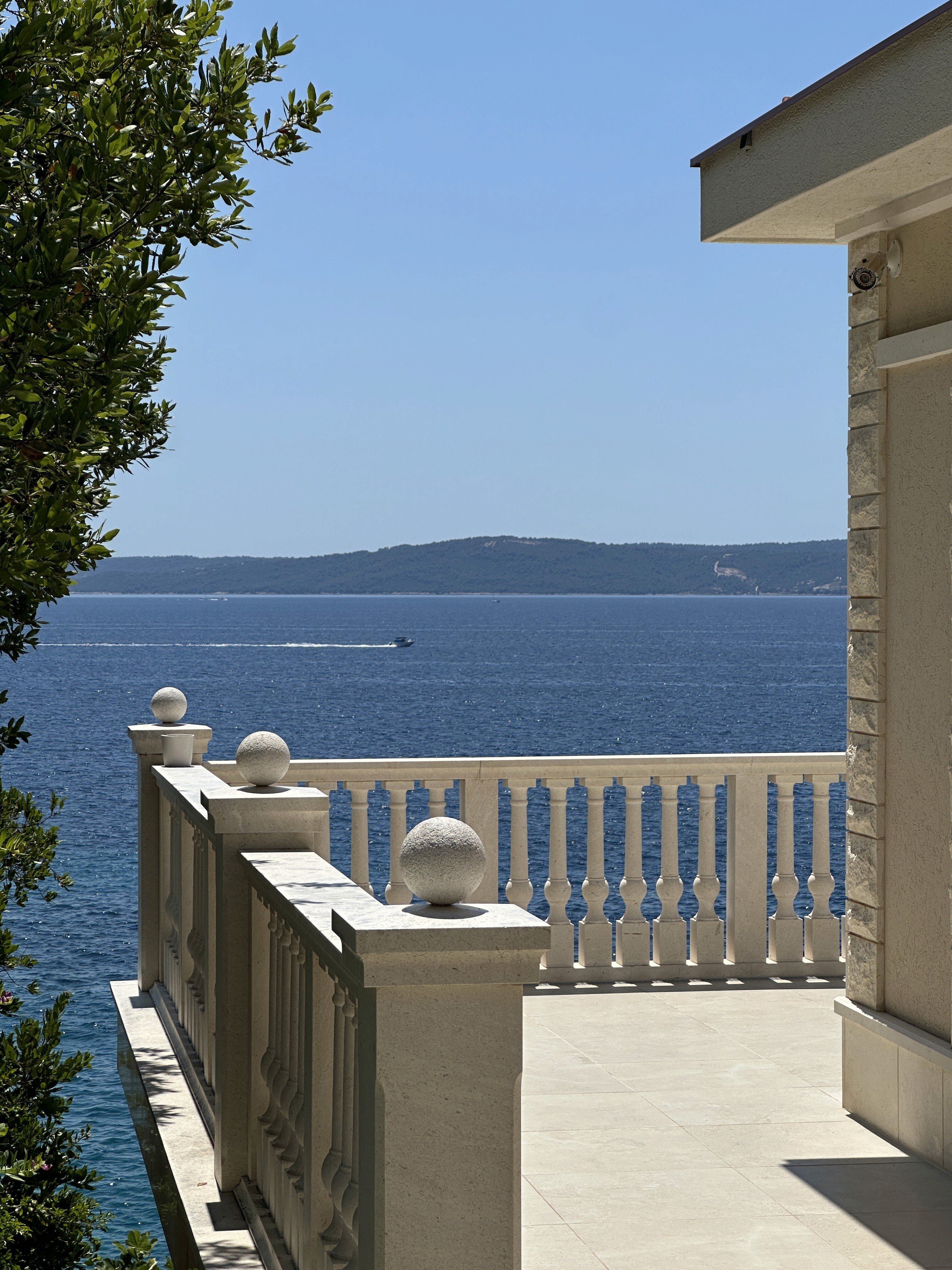 Aerial view of a dense cityscape with skyscrapers at sunrise.