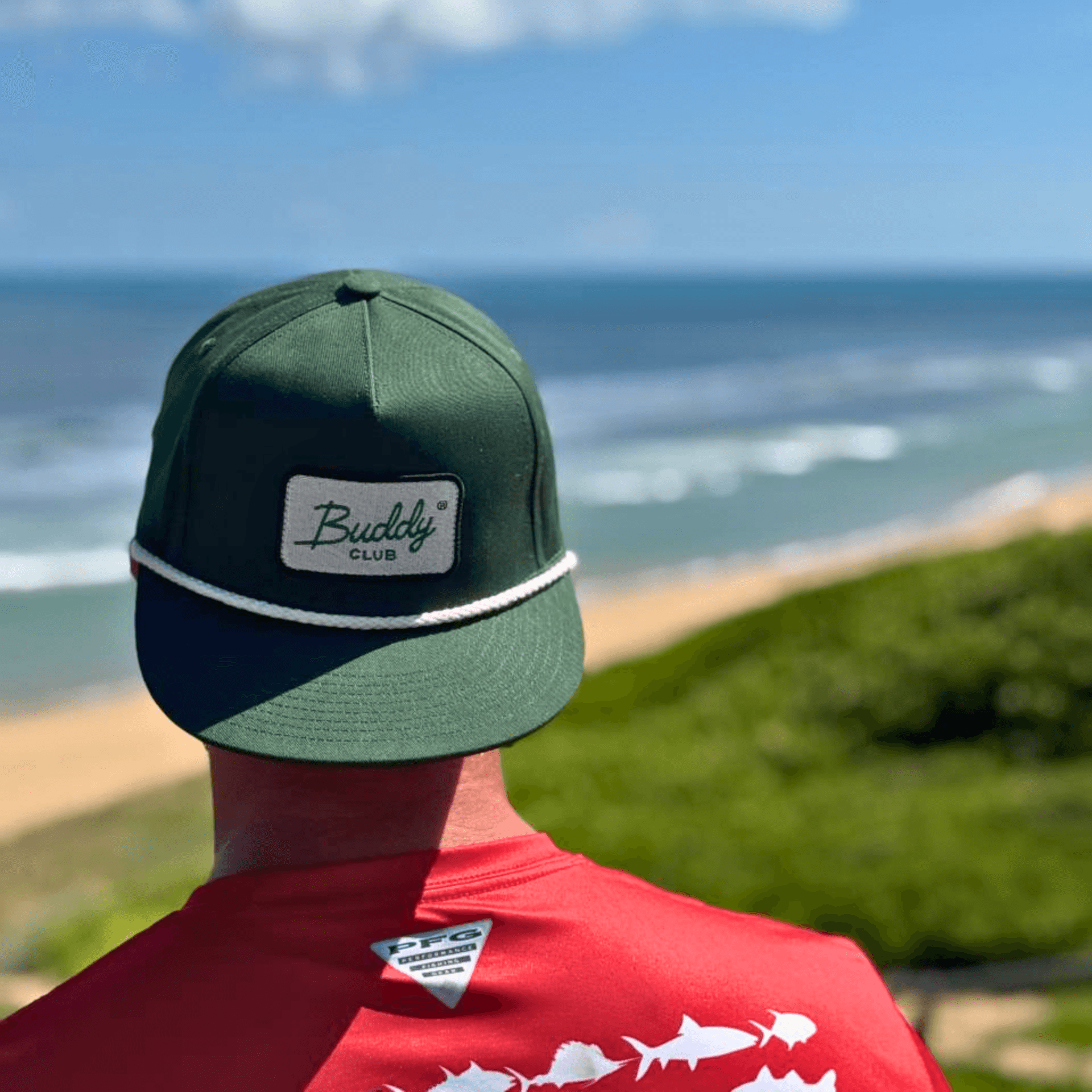 Angled view of a black athletic sneaker lying on its side, showcasing its textured, high-traction sole design against a neutral background.