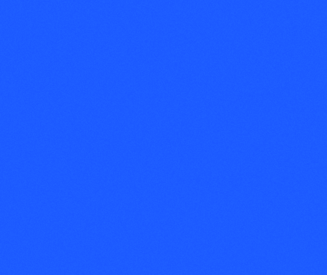 kids lying on a glass land and smiling