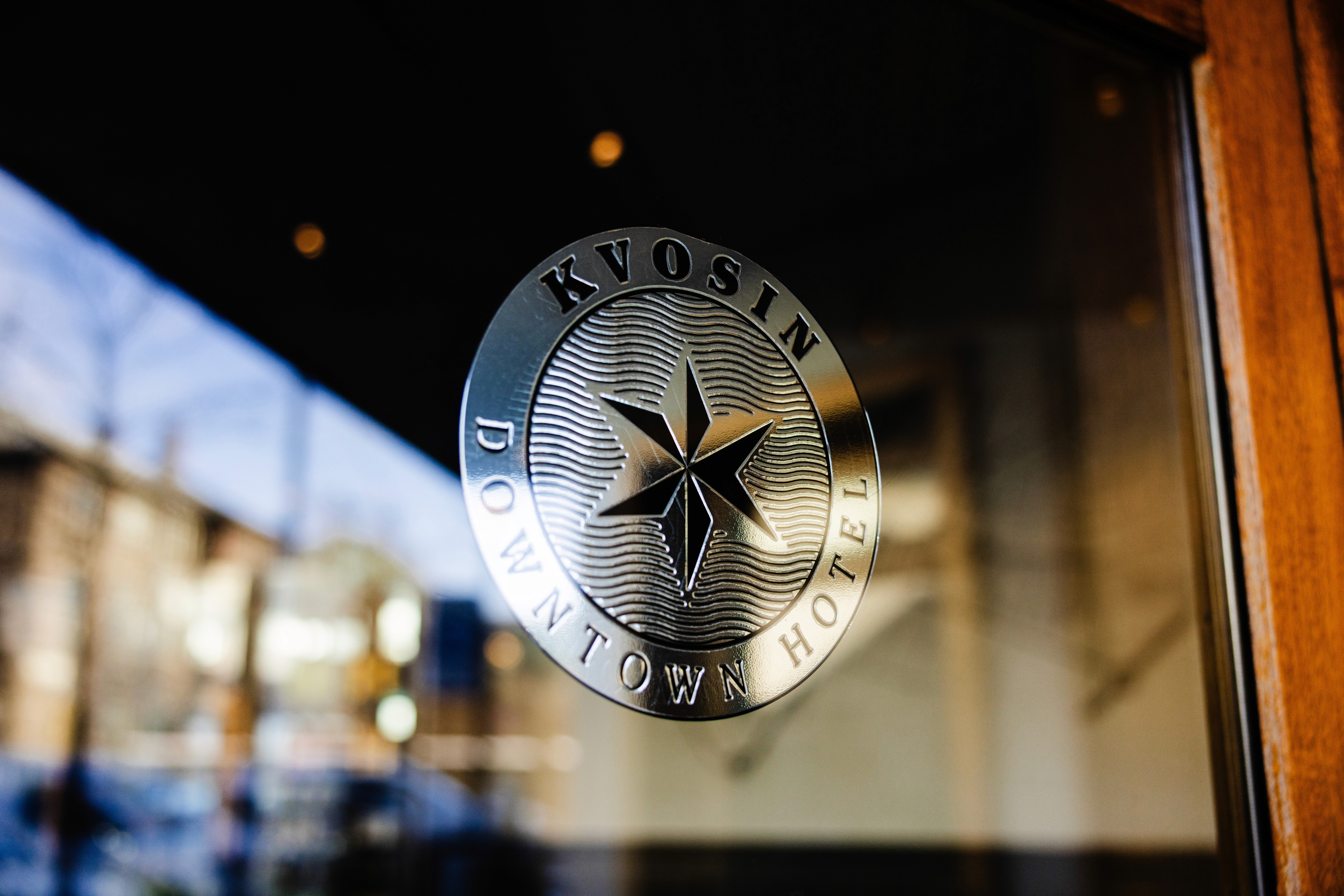 Close-up of the Kvosin Downtown Hotel logo at its Reykjavik location.