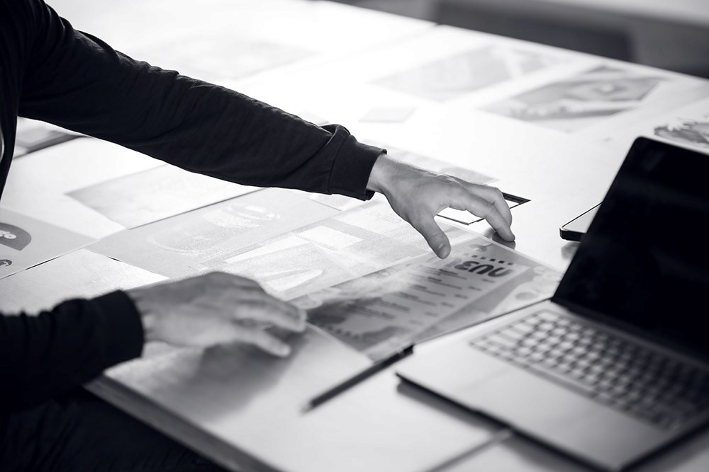 Taides brand photography by Kyttn. Shot of desk and papers