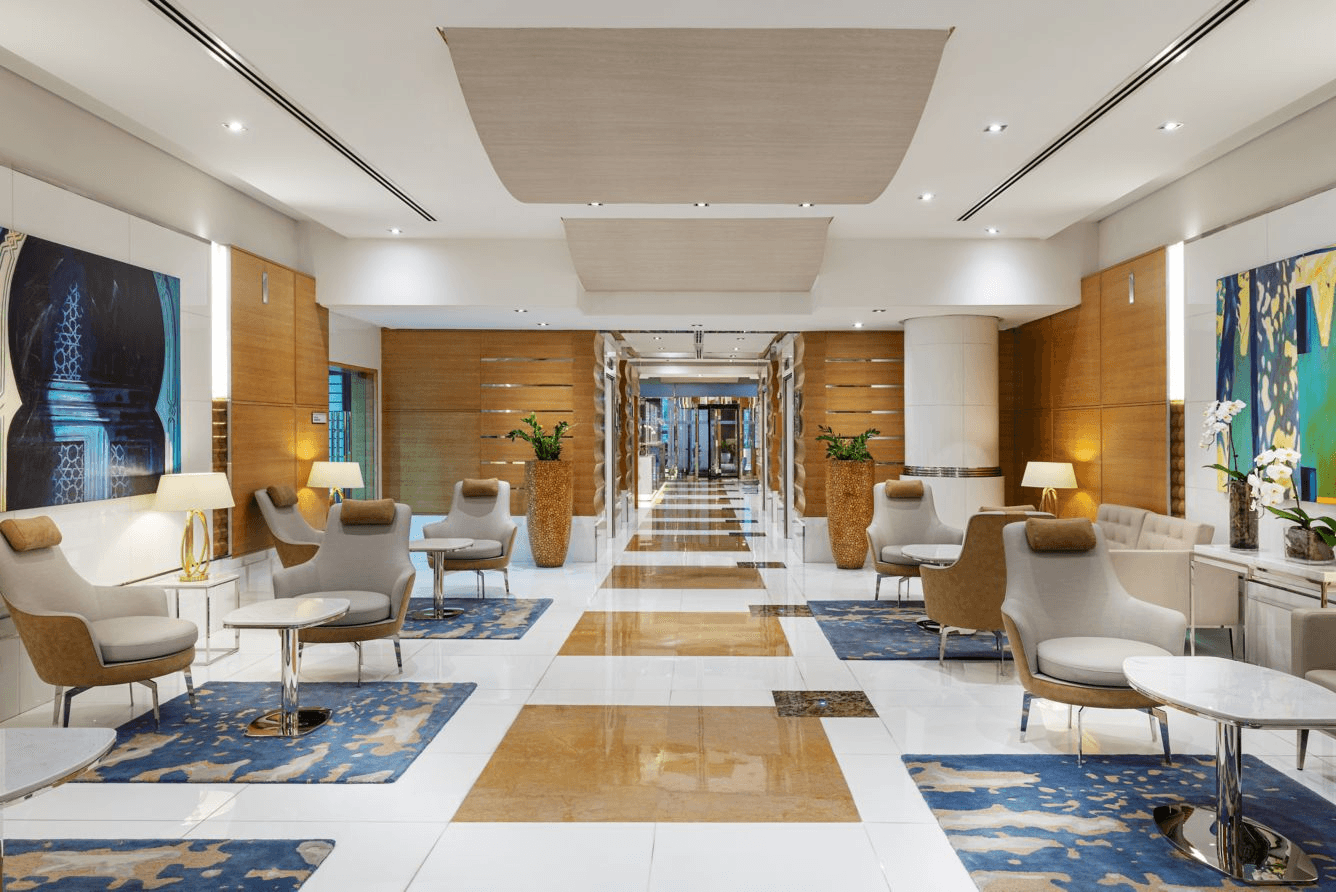 Pet-friendly hotel lobby at Delta Hotels by Marriott Jumeirah Beach with modern seating and bright open interiors.