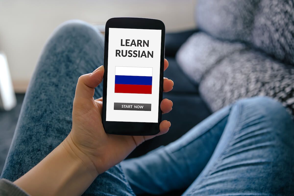 Person Using Mobile - Best Apps for Learning Russian