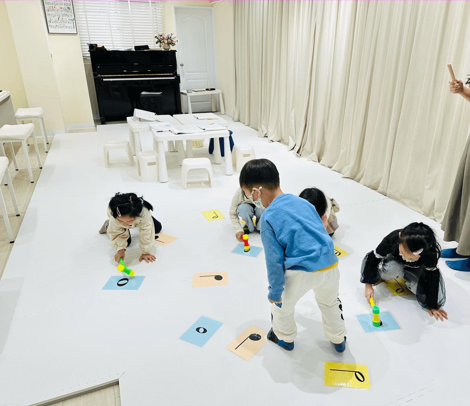 Minimalist abstract image of a stylized turquoise hand gesture on a dark background