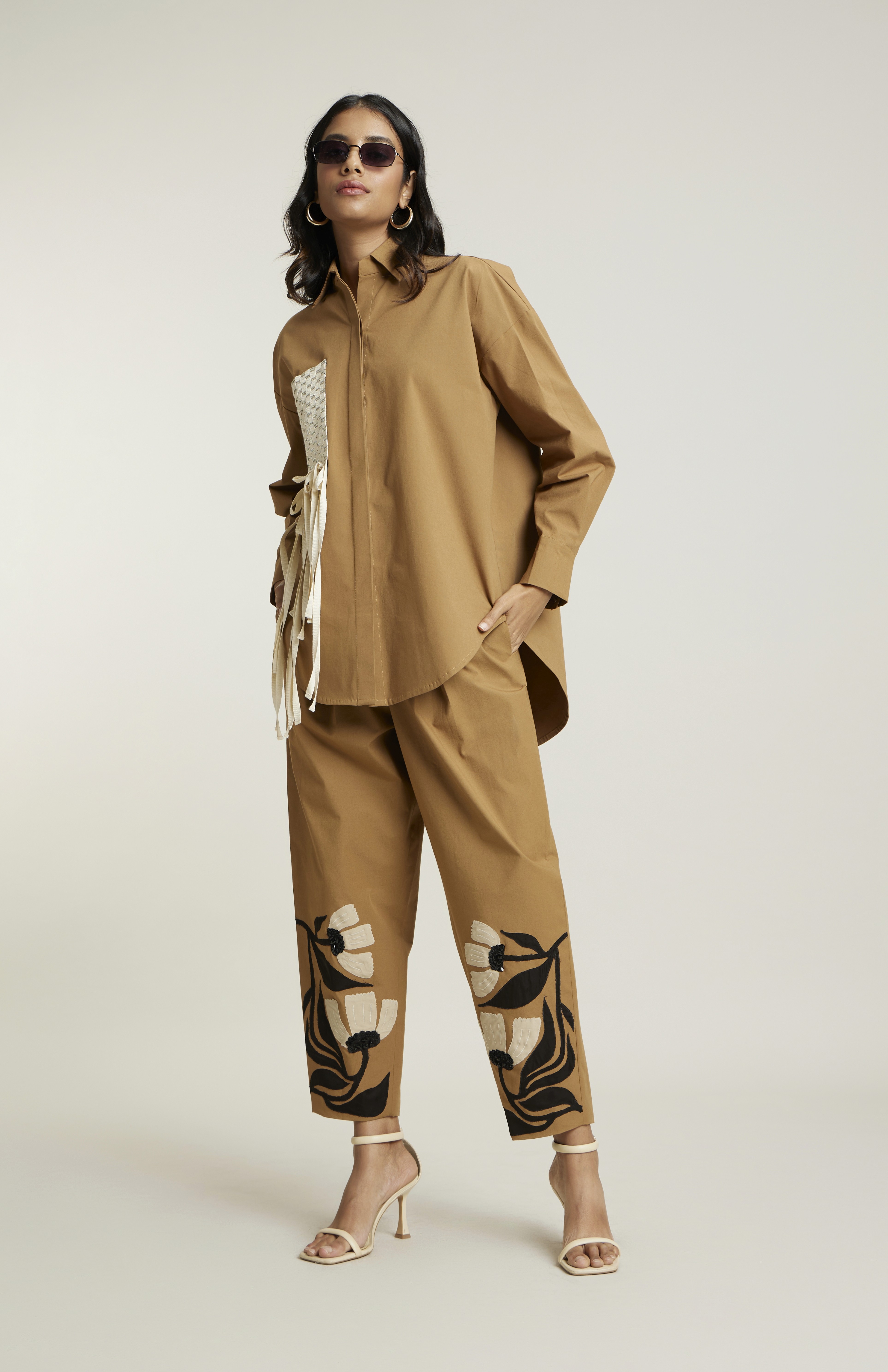 Friends laughing and posing inside a car