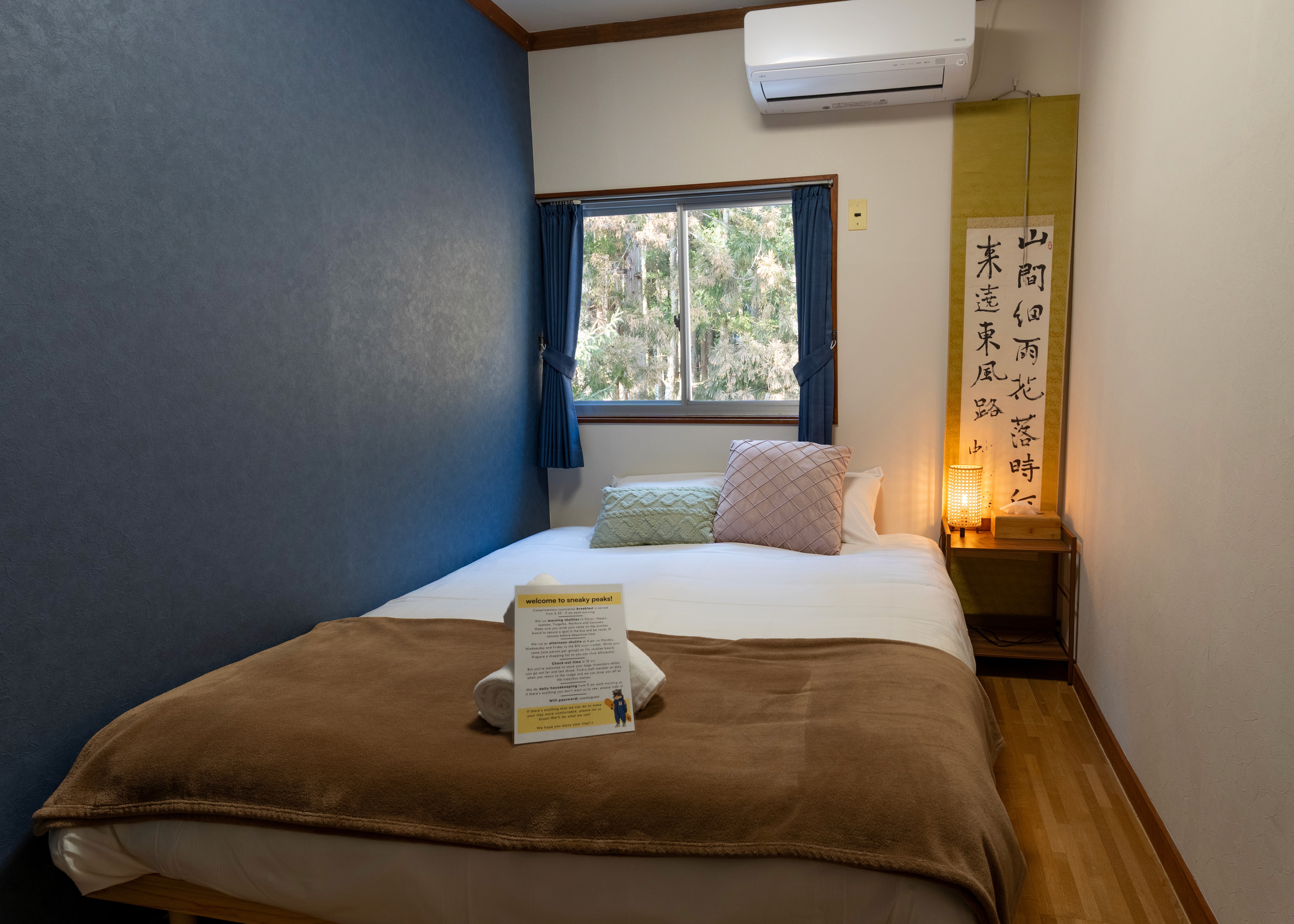 Economy Queen room interior at Sneaky Peaks, Hakuba