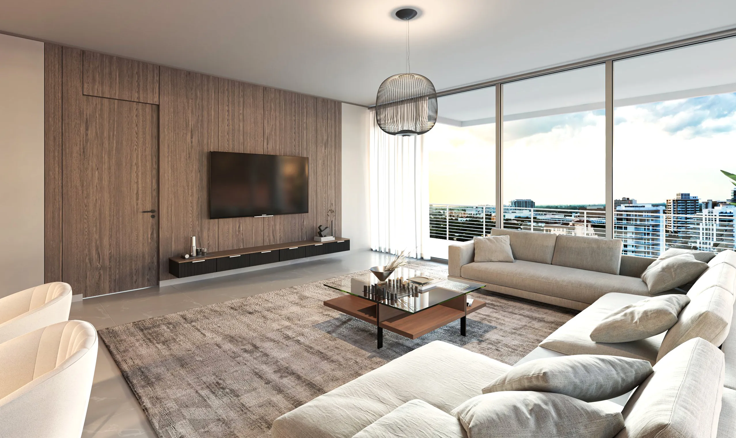 A stylish modern living room with a comfortable seating area and a prominent large television as the focal point.