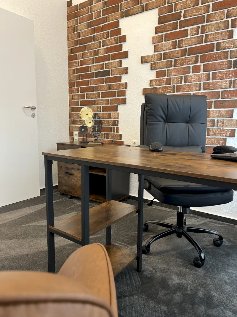 black flat screen tv on brown wooden table