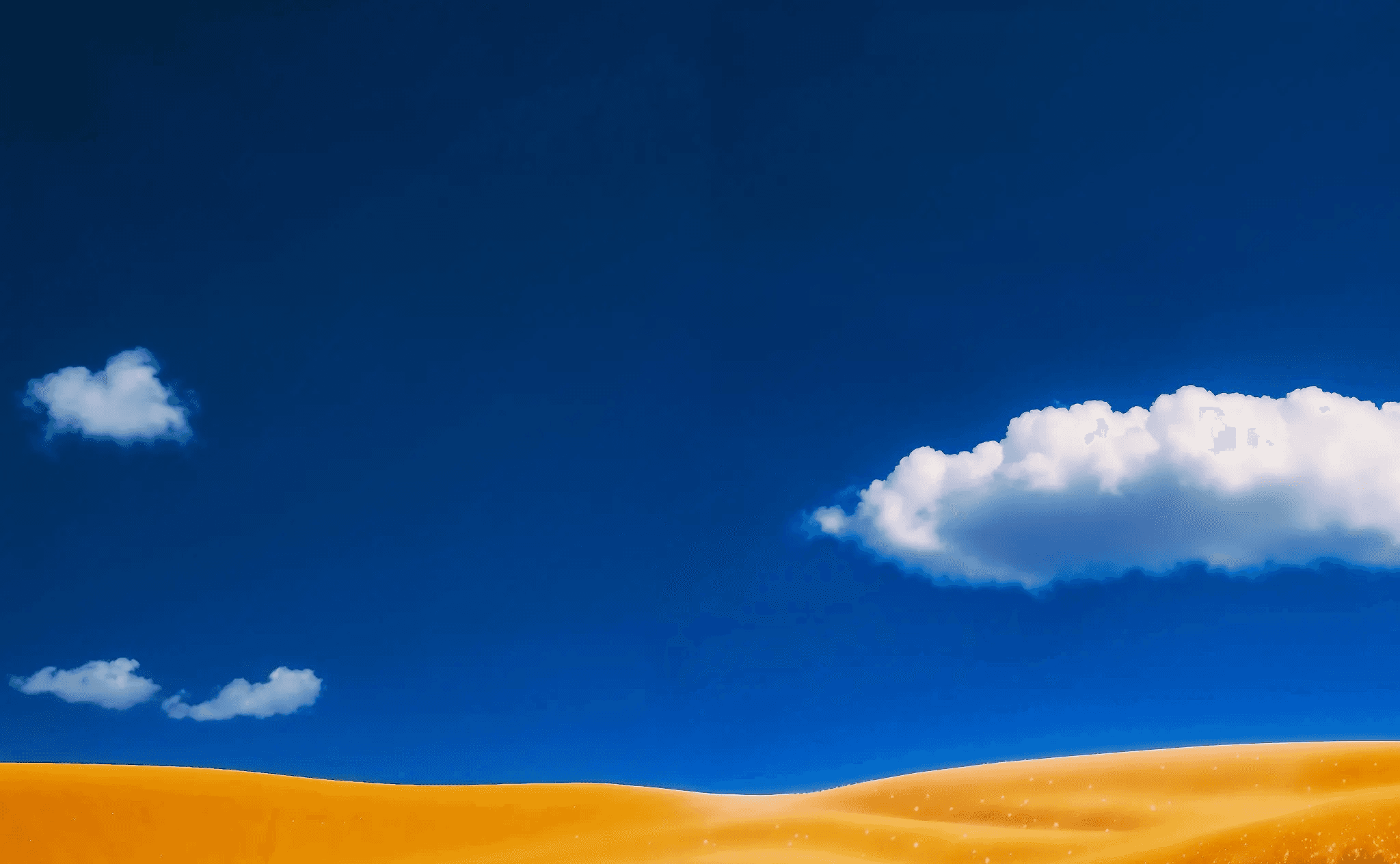A single green tree stands in a bright golden, shimmering field with a vibrant blue river and blue sky overhead