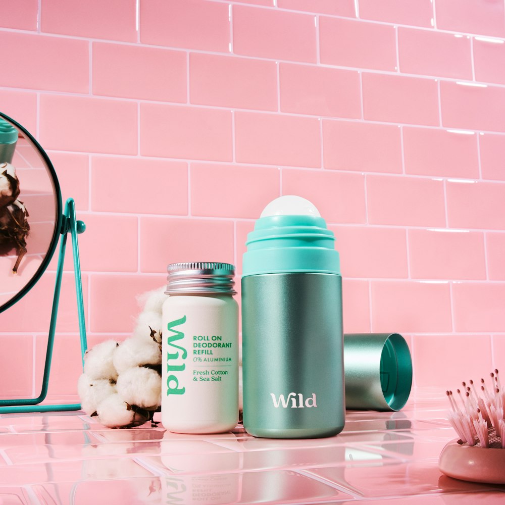 A custom-engineered Wild Cosmetics deodorant refill bottle made of VIVOMER. Highlighting Shellworks' bespoke structural design capabilities, this complex packaging format functions exactly like conventional plastic during use but safely composts at end-of-life without leaving microplastics.