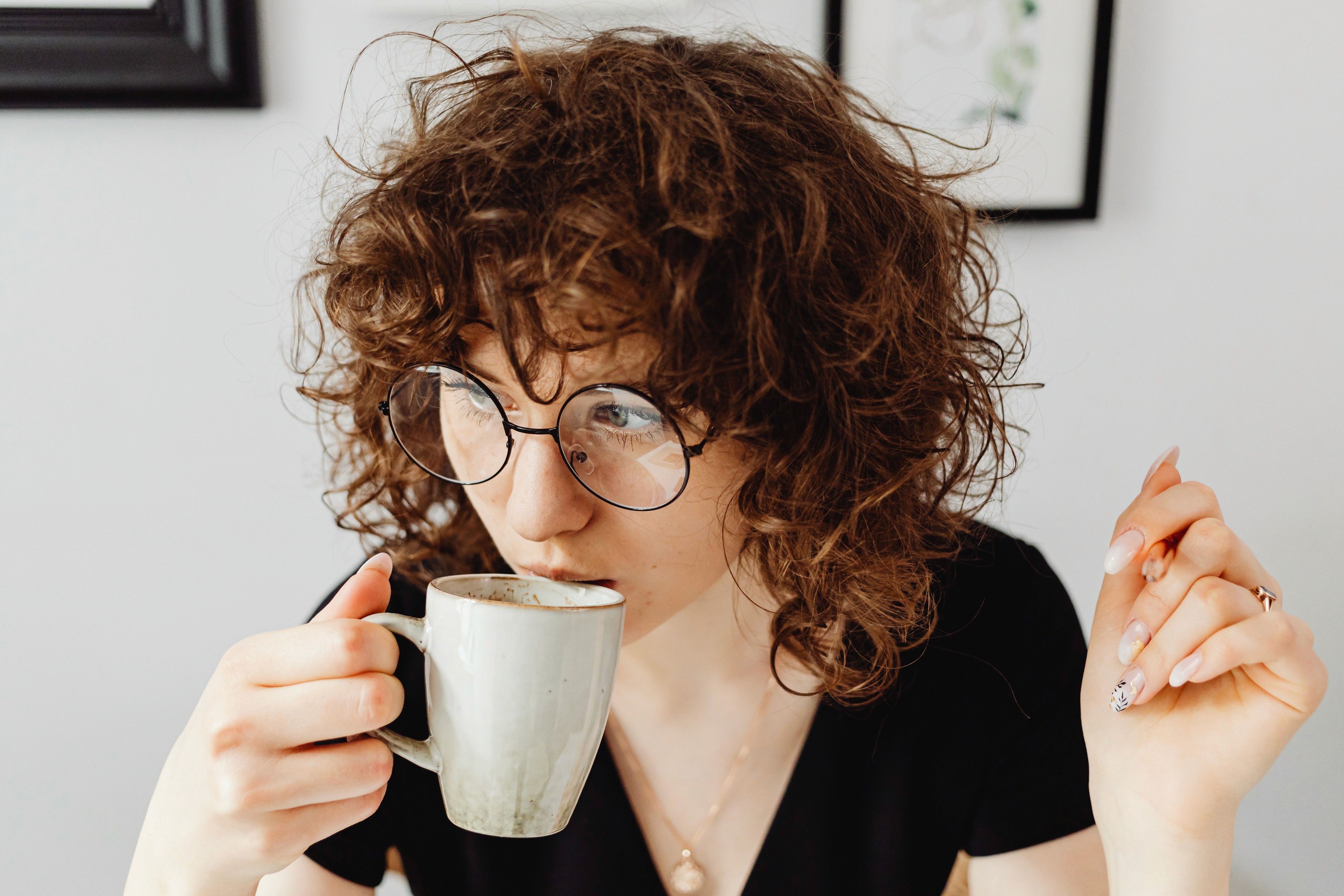a girl drinking coffee