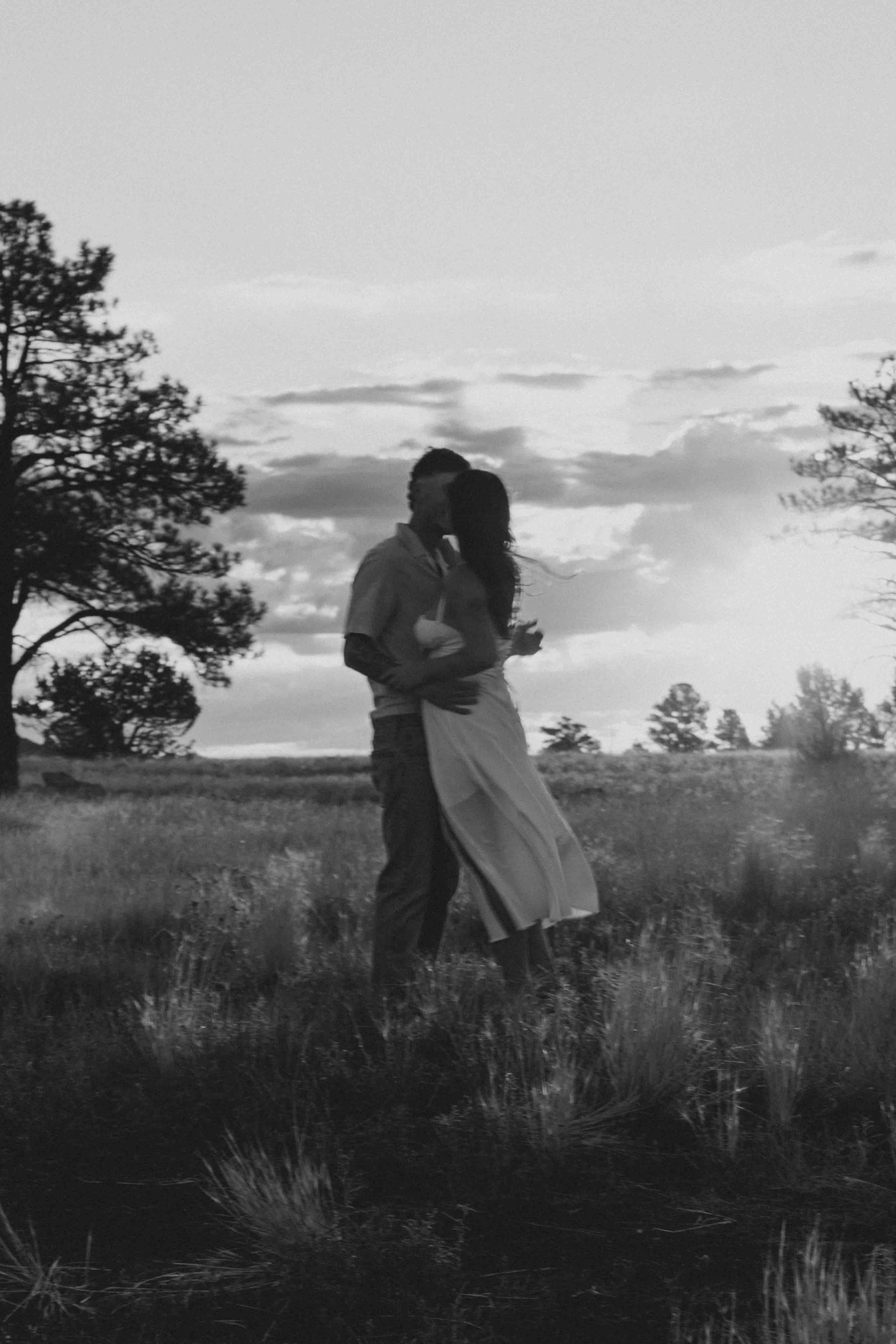Black and white candid engagement photo in flagstaff arizona.