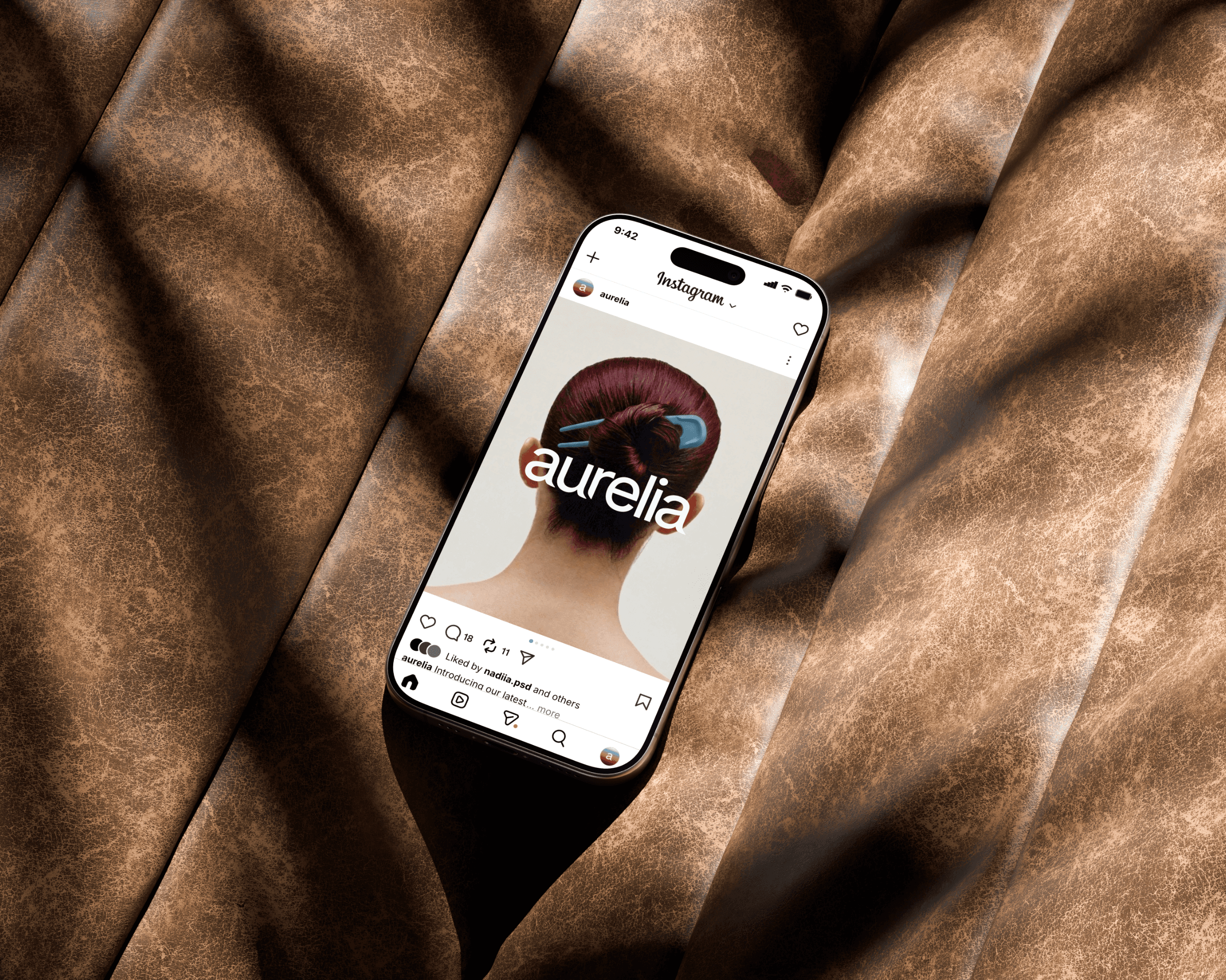 A mockup of an Aurelia Haircare Instagram post. The post features an image of a red-headed woman with a blue pin in her hair. The brand logo is featured in the middle of the image.
