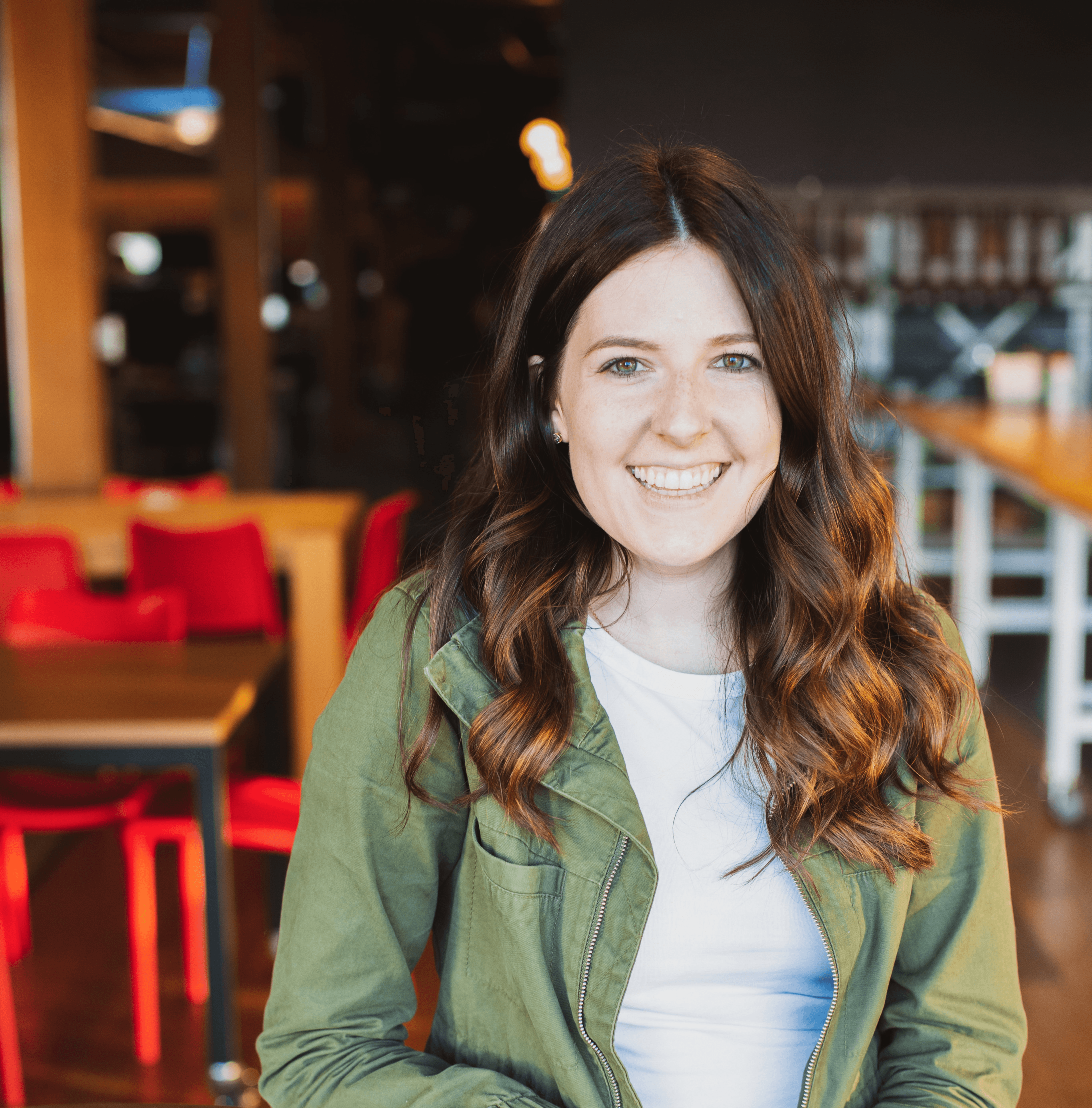 Designer Amy sitting at a table