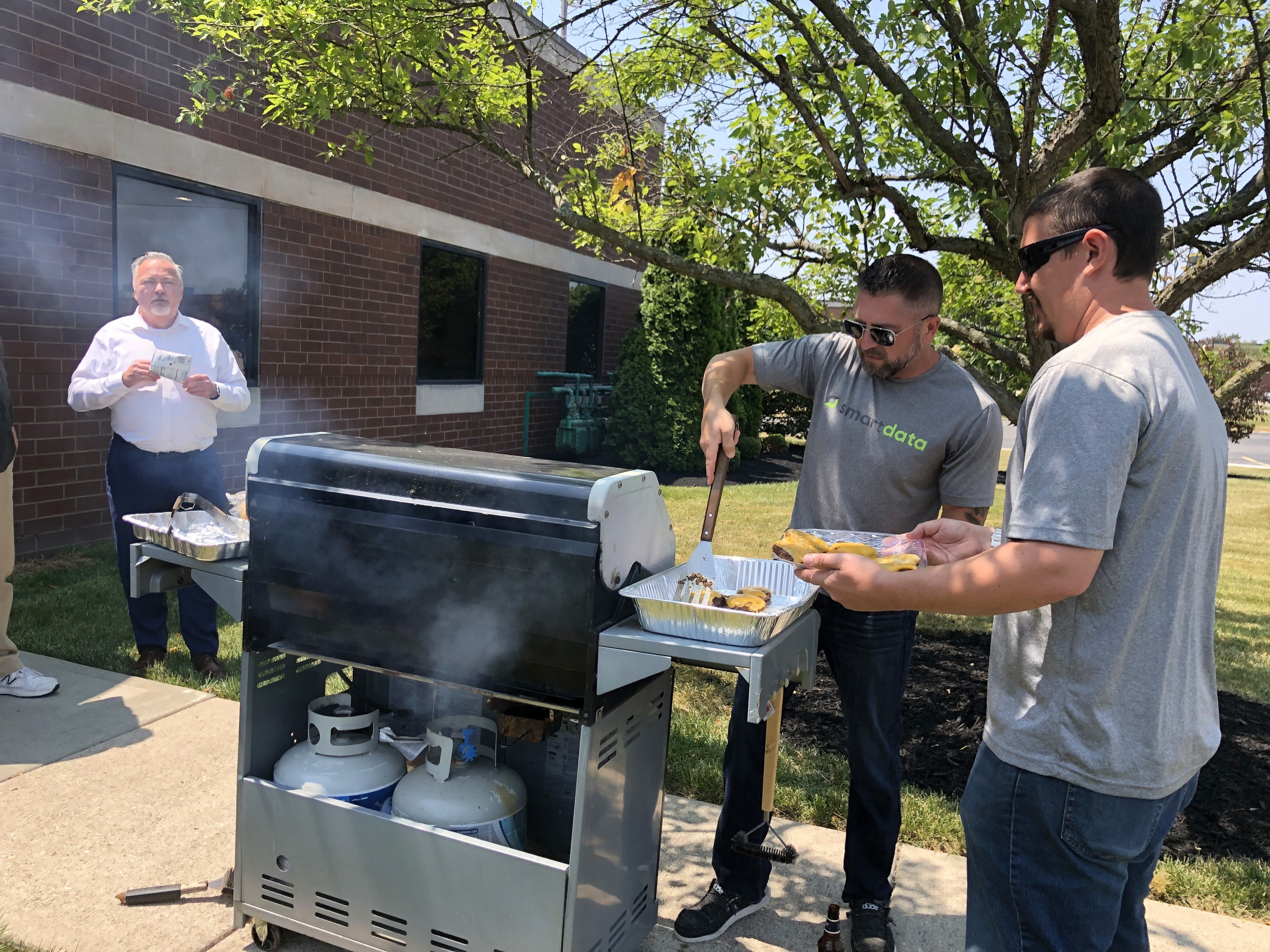 Smart Data Employees in the office having fun at a cookout