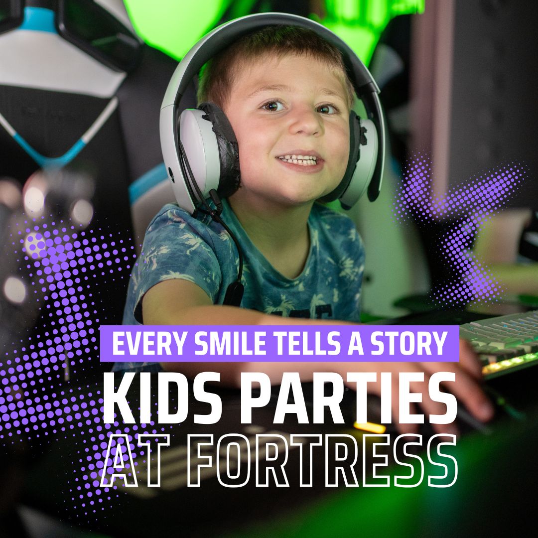 A Kid playing a gaming PC at Fortress Games