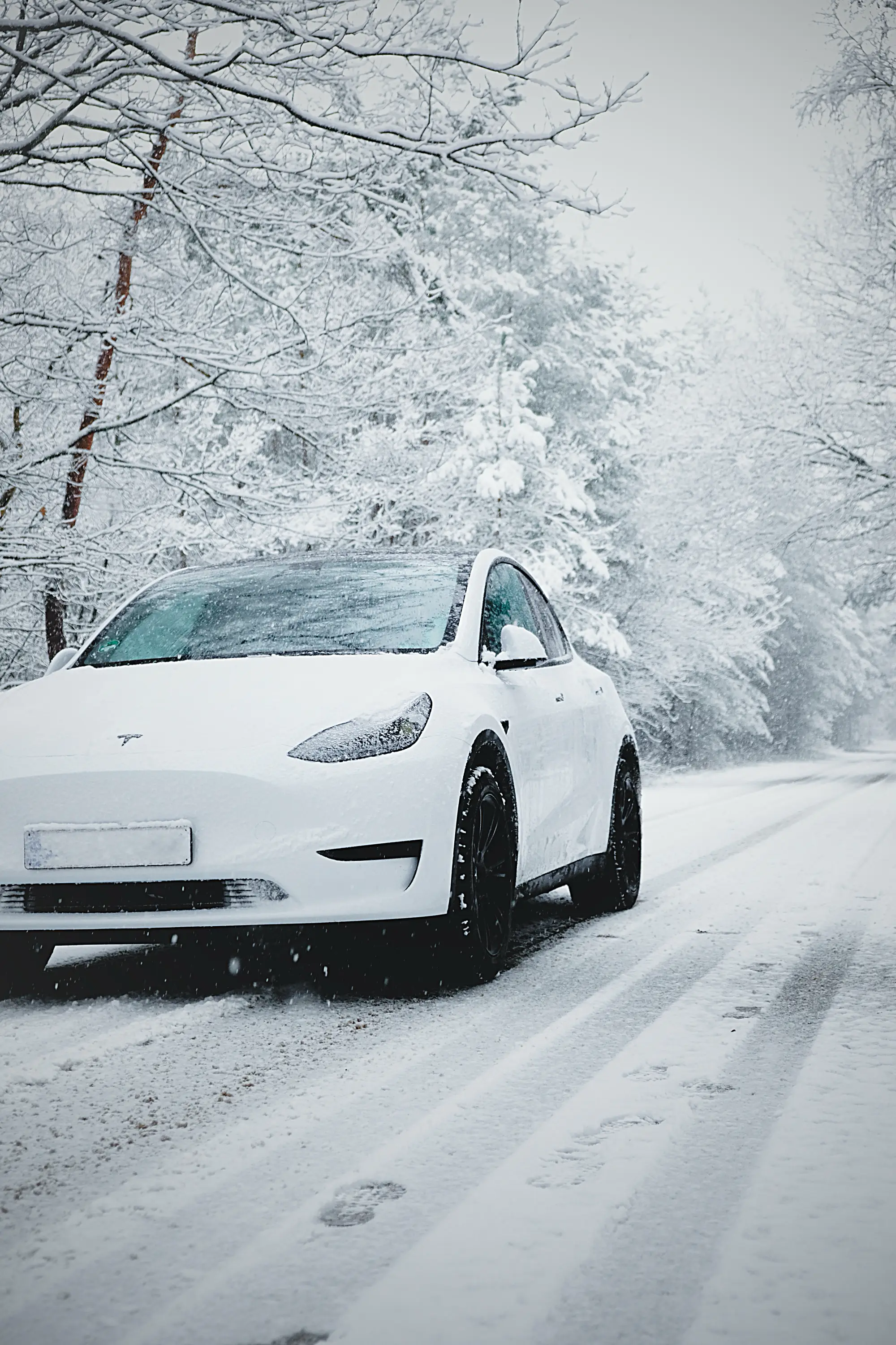 Automotive photography for Tesla magazines and social media. Tesla Model Y in the snow.