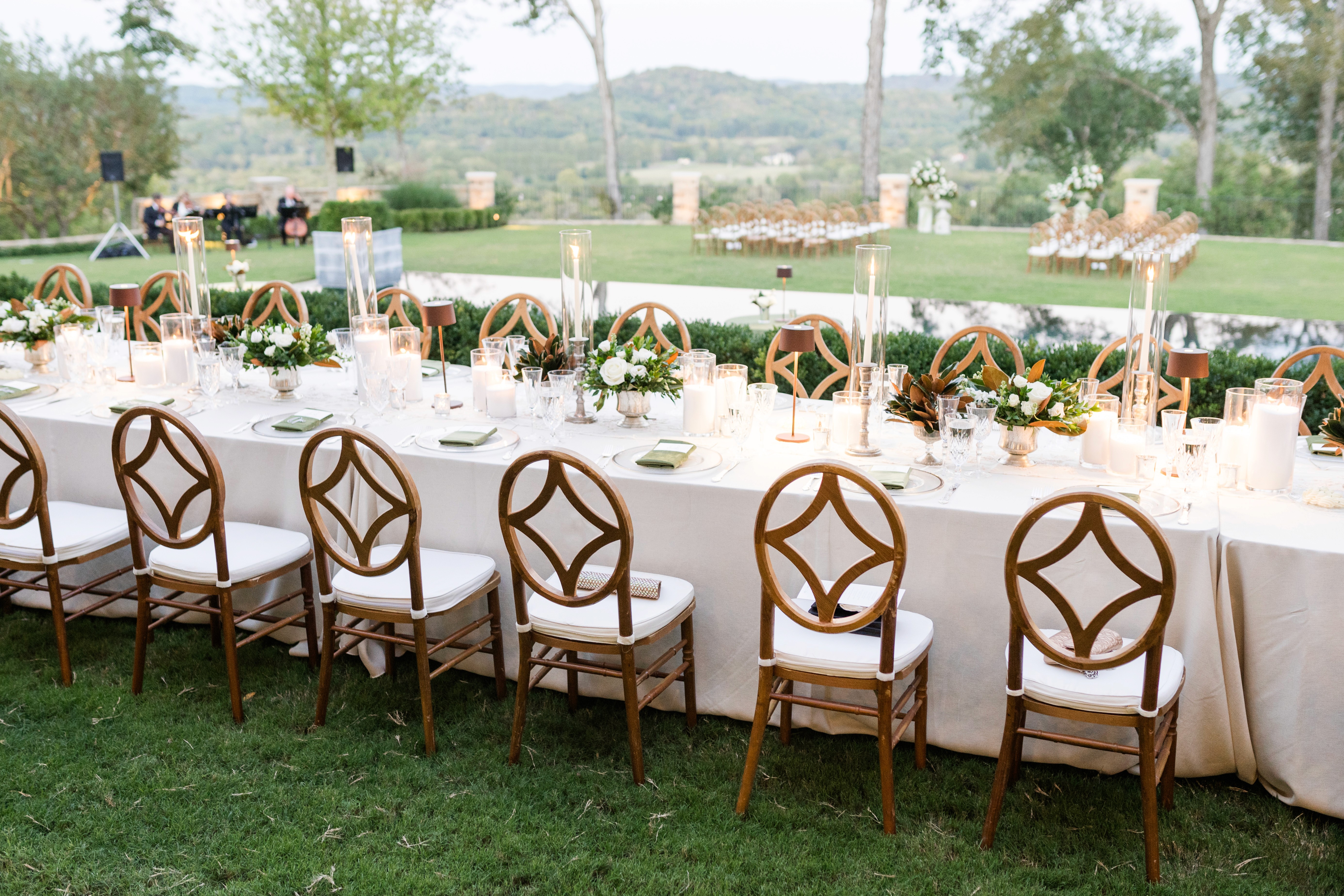 Bride and groom portrait with vintage car at the Swan House in Atlanta Georgia.