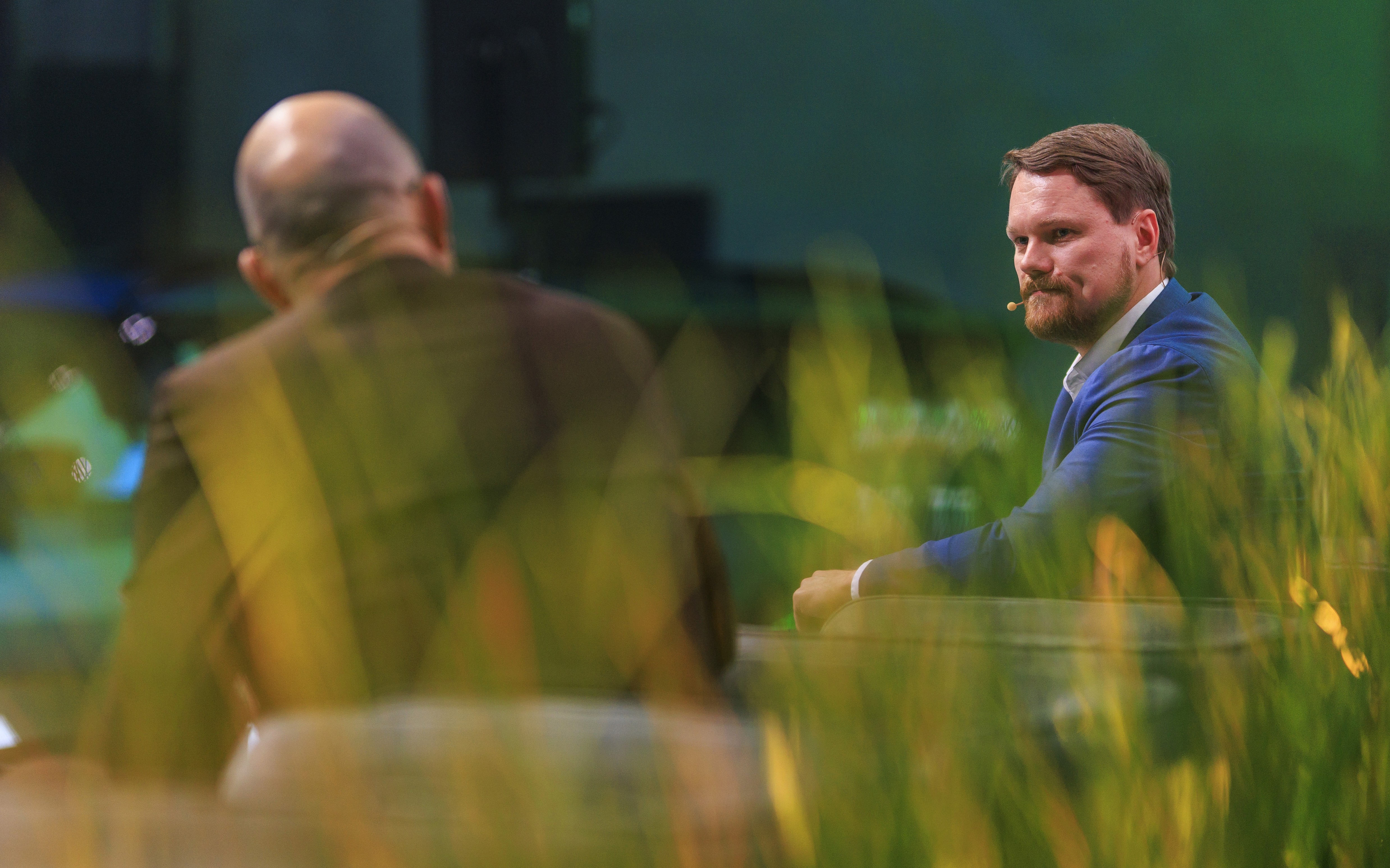 People sitting and listening to a speaker