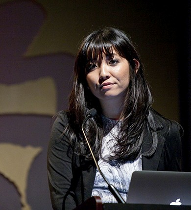 portrait of a woman giving a speech