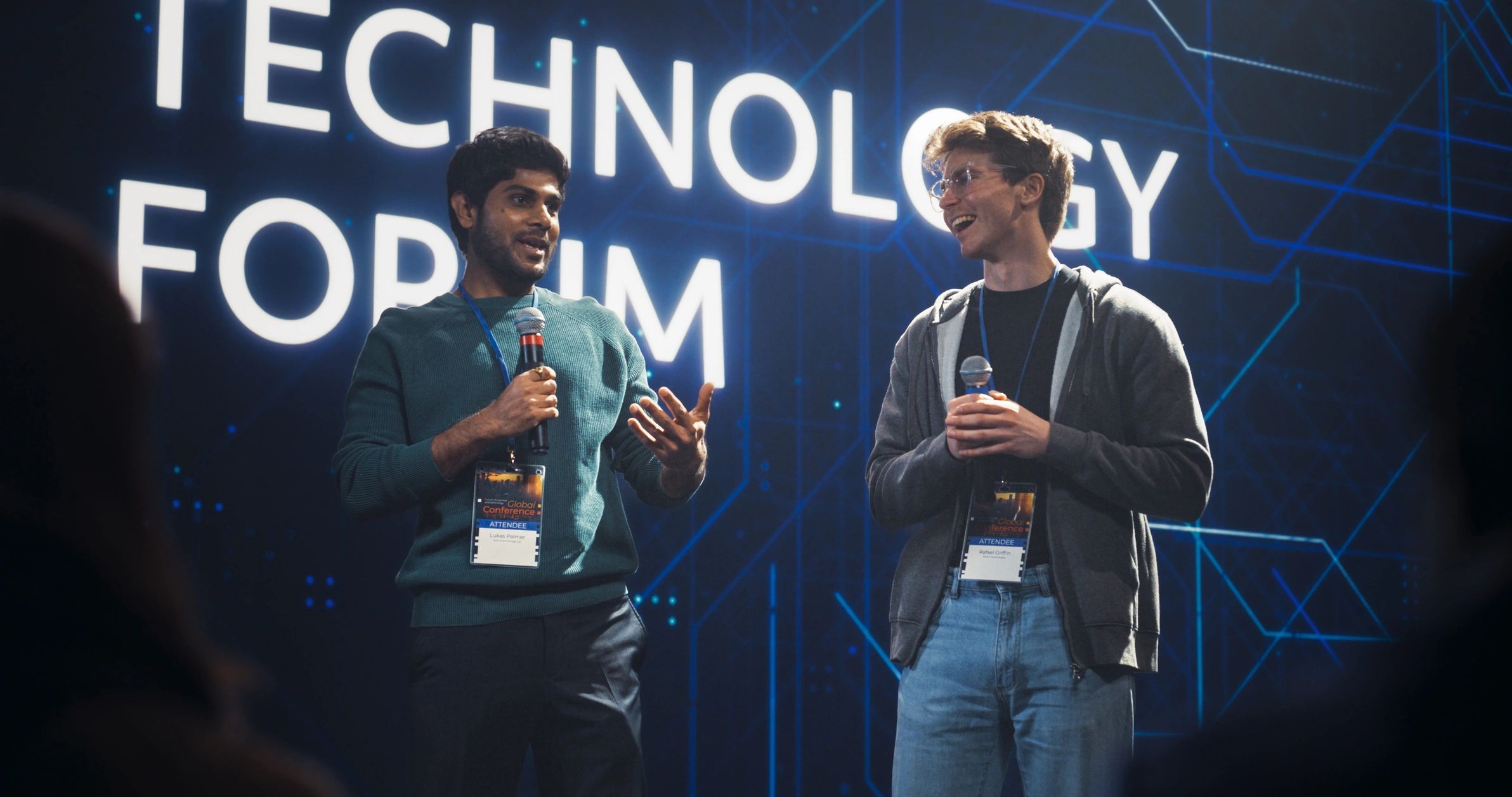 a black and white living room with a large tv
